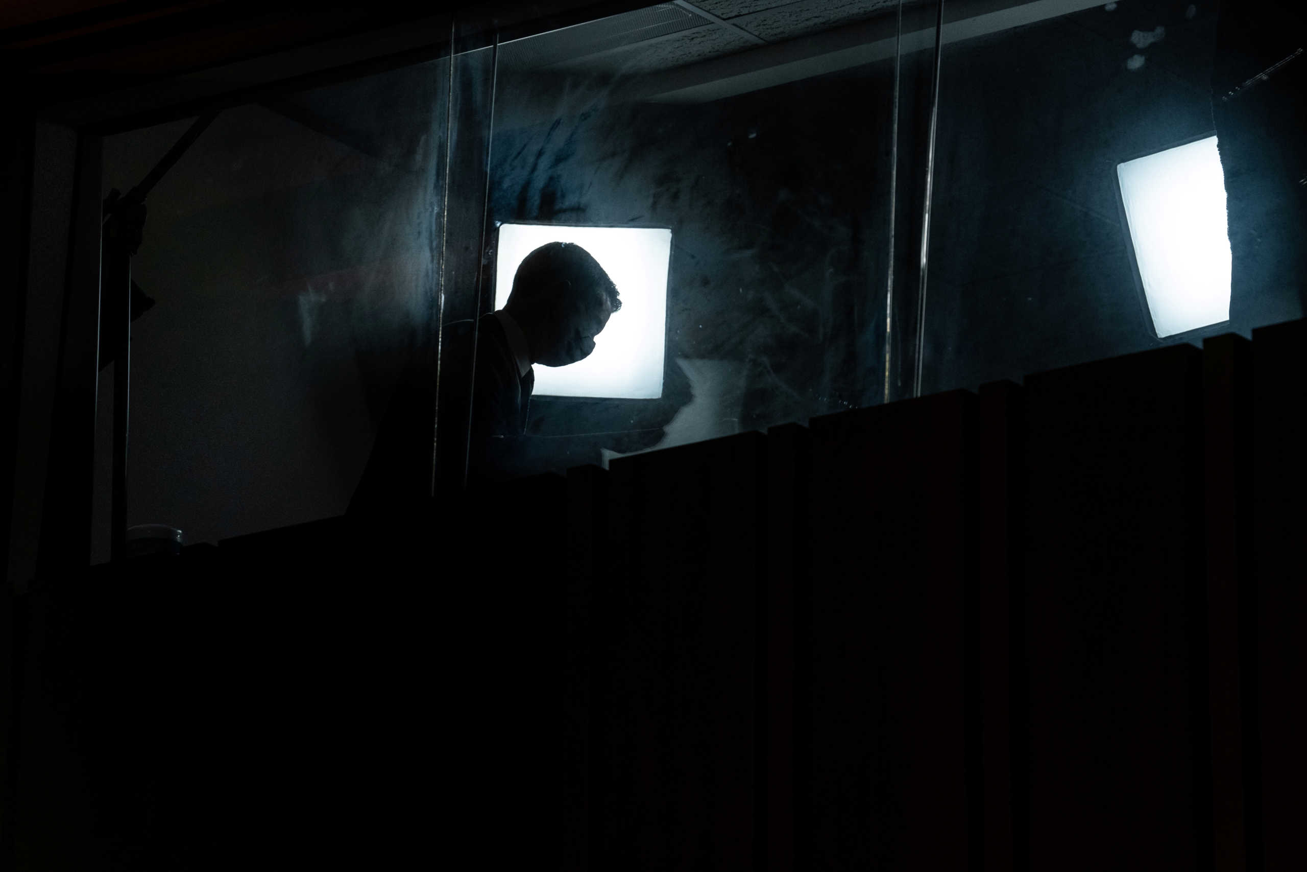 A journalist is seen in a broadcasting skybox overlooking the hearing room during the third day of the confirmation hearing for Supreme Court nominee Judge Amy Coney Barrett before the Senate Judiciary Committee on Capitol Hill in Washington, DC, U.S., October 14, 2020.   Erin Schaff