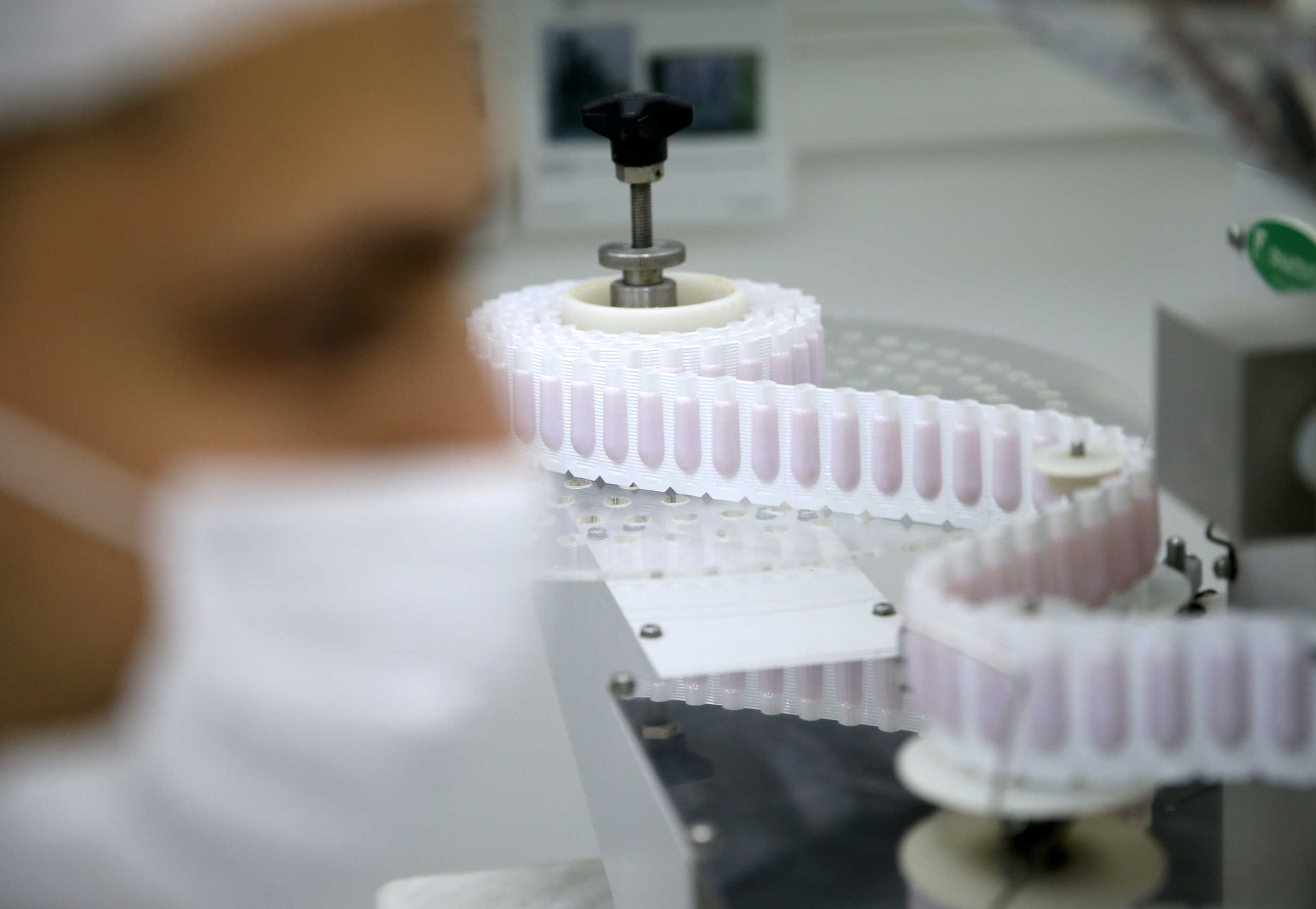 A pharmacist produces natural remedies at Pharmamed's facilities in Travnik, Bosnia and Herzegovina October 15, 2020. Picture taken October 15, 2020. REUTERS