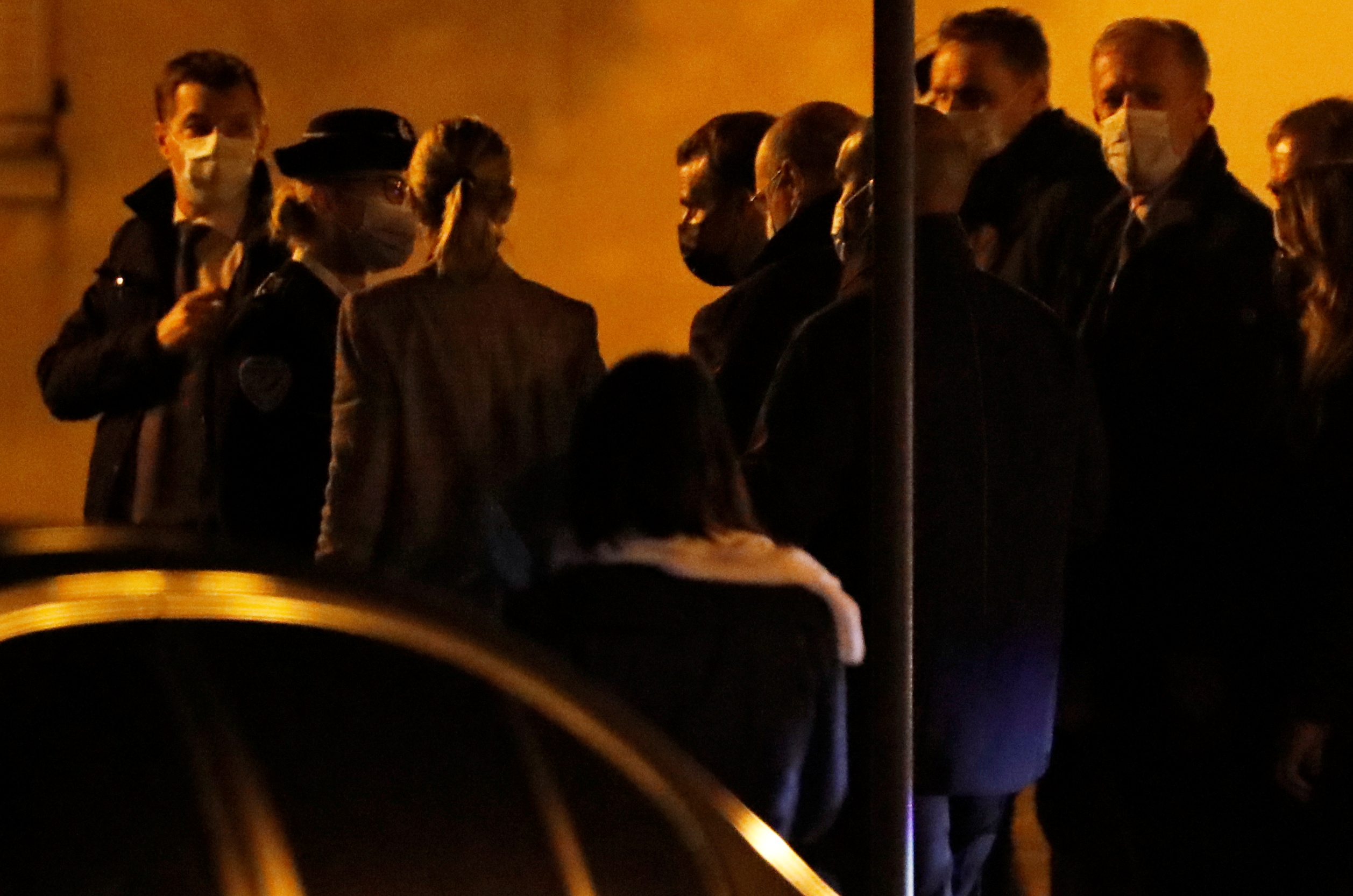 French President Emmanuel Macron arrives to visit the scene of a stabbing attack in the Paris suburb of Conflans St Honorine, France, October 16, 2020. REUTERS