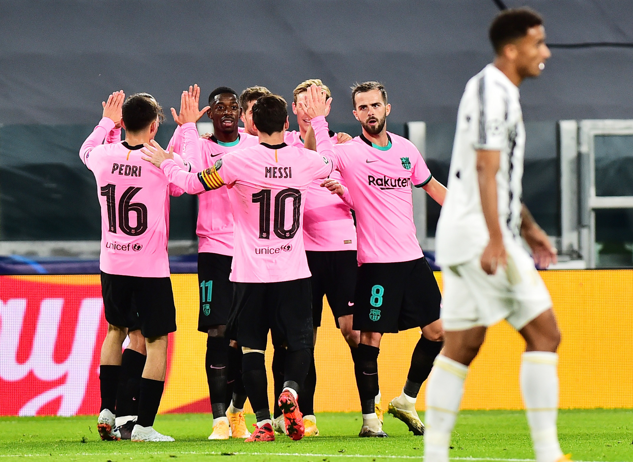 Soccer Football - Champions League - Group G - Juventus v FC Barcelona - Allianz Stadium, Turin, Italy - October 28, 2020  Barcelona's Ousmane Dembele celebrates scoring their first goal with teammates REUTERS