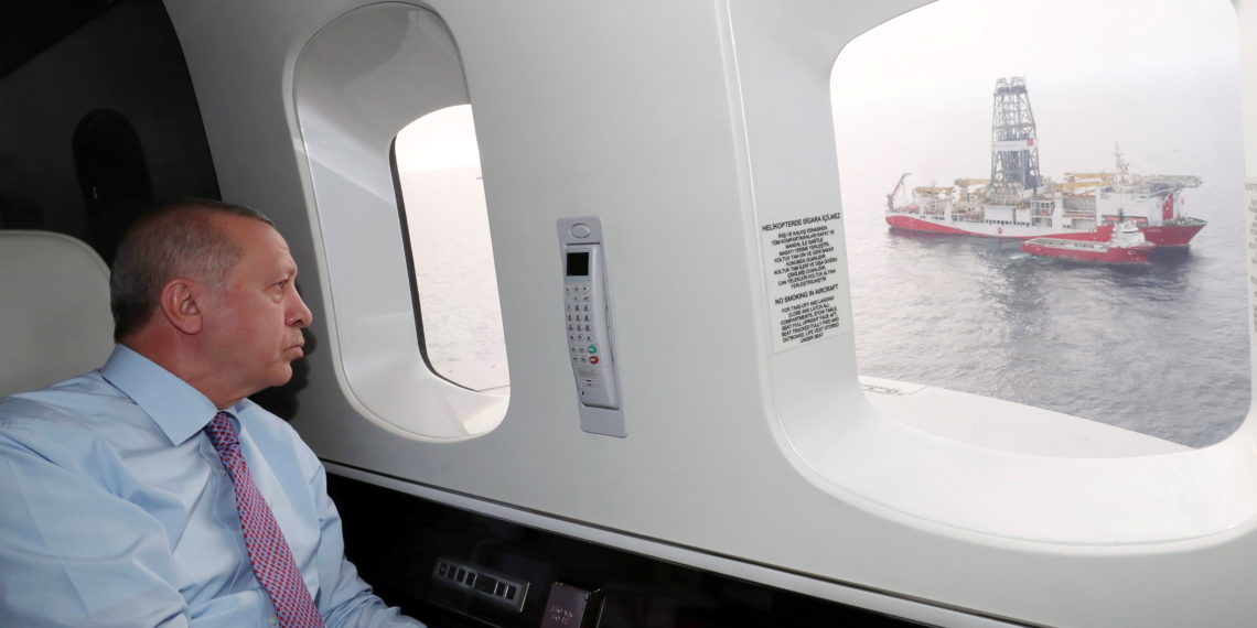 Turkish President Tayyip Erdogan looks at the drilling vessel Fatih from his helicopter off Black Sea city of Zonguldak, Turkey, October 17, 2020. Murat Cetinmuhurdar