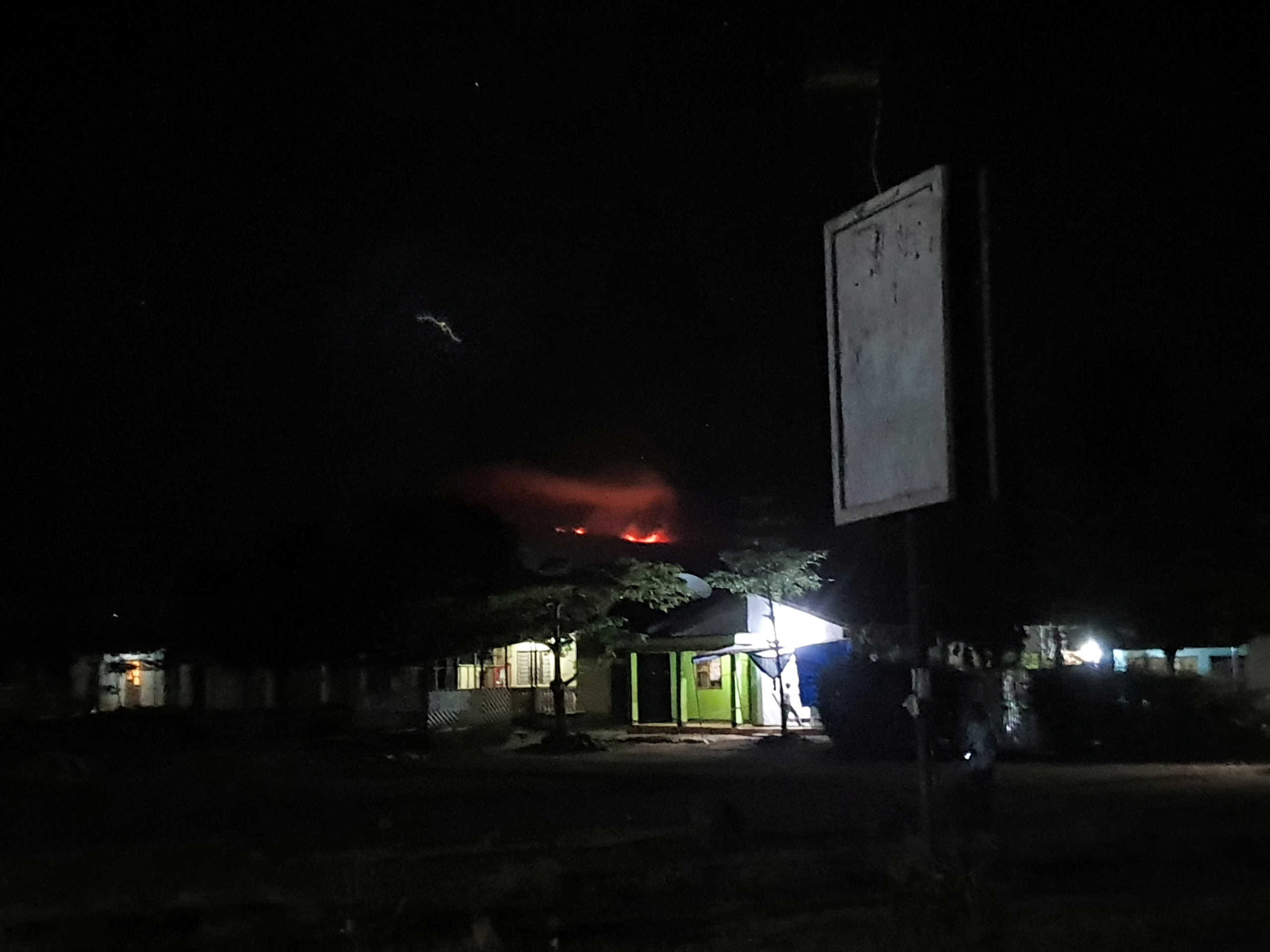 A view of the fire's glow on Mount Kilimanjaro seen from Moshi, Tanzania October 11, 2020 in this image taken from social media. Instagram @jaysadventure_kilimanjaro via REUTERS THIS IMAGE HAS BEEN SUPPLIED BY A THIRD PARTY. NO RESALES. NO ARCHIVES. MANDATORY CREDIT