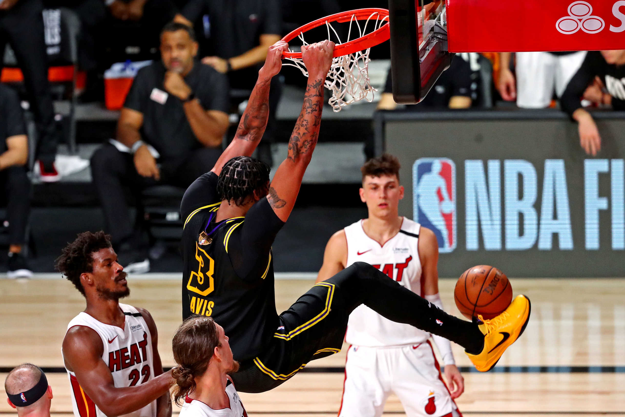 Oct 2, 2020; Orlando, Florida, USA;  Los Angeles Lakers forward Anthony Davis (3) dunks the ball against Miami Heat forward Kelly Olynyk (9) during the fourth quarter in game two of the 2020 NBA Finals at AdventHealth Arena. Mandatory Credit: Kim Klement-USA TODAY Sports