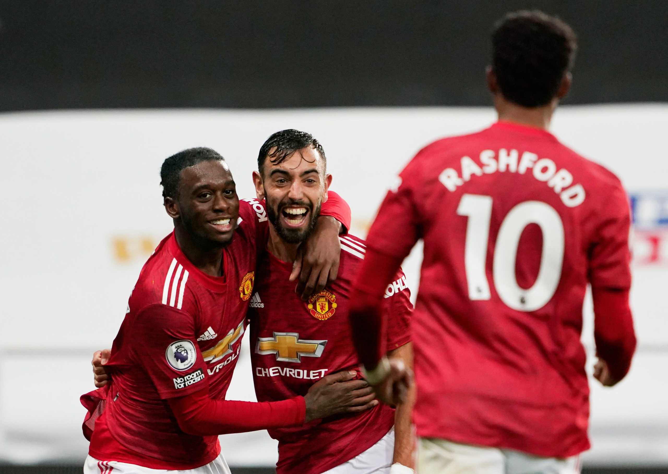 Soccer Football - Premier League - Newcastle United v Manchester United - St James' Park, Newcastle, Britain - October 17, 2020 Manchester United's Bruno Fernandes celebrates scoring their second goal with teammates Pool via REUTERS