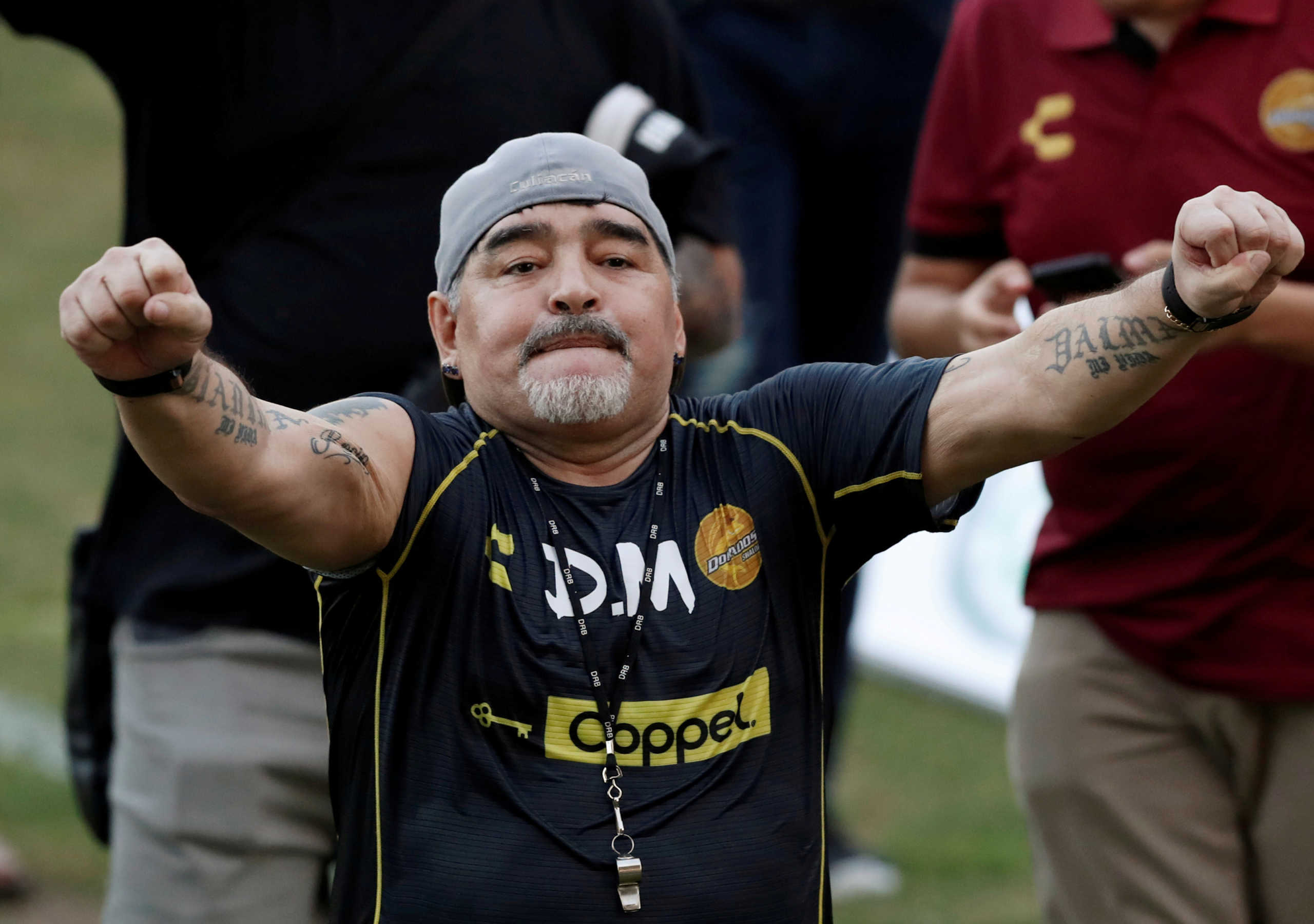 FILE PHOTO: Argentinian soccer legend Diego Armando Maradona reacts to fans during his first training session as coach of Dorados at the Banorte stadium in Culiacan, in the Mexican state of Sinaloa, Mexico September 10, 2018. REUTERS