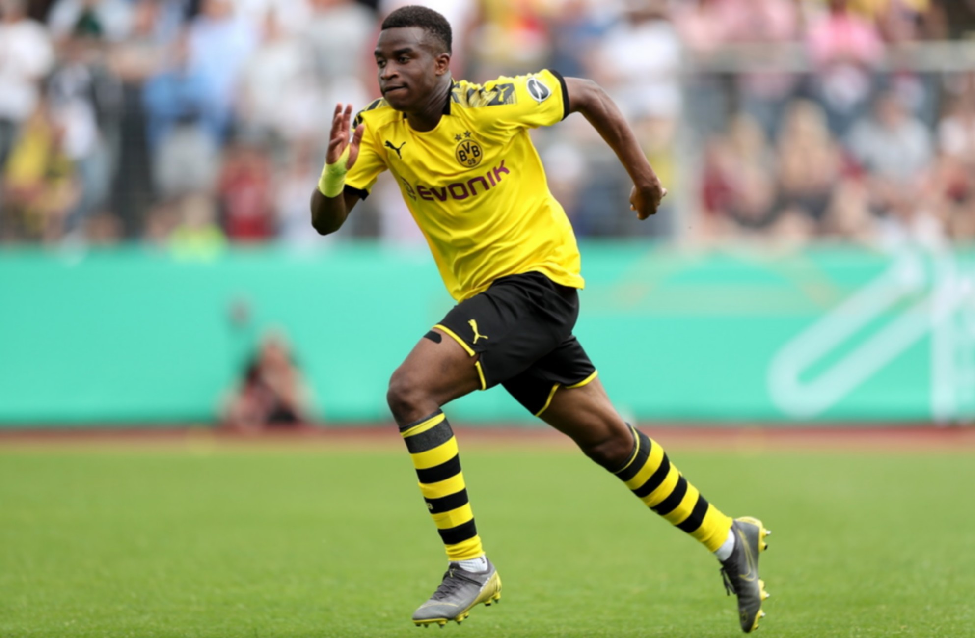 epa08338663 (FILE) Borussia Dortmund's Youssoufa Moukoko in action during the U17 German Championship final soccer match between Borussia Dortmund and 1. FC Cologne in Dortmund, Germany, 16 June 2019 (re-issued 02 April 2020). The 15-year-old Moukoko, who turns 16 in November, will be eligible to make his debut in the German Bundesliga after the German Football League 'DFL' assembly approved the request to change the minimum age to 16.  EPA