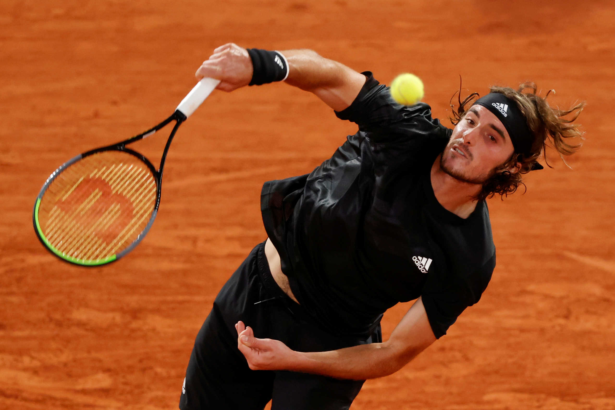 Tennis - French Open - Roland Garros, Paris, France - October 5, 2020  Greece's Stefanos Tsitsipas in action during his fourth round match against Bulgaria's Grigor Dimitrov  REUTERS