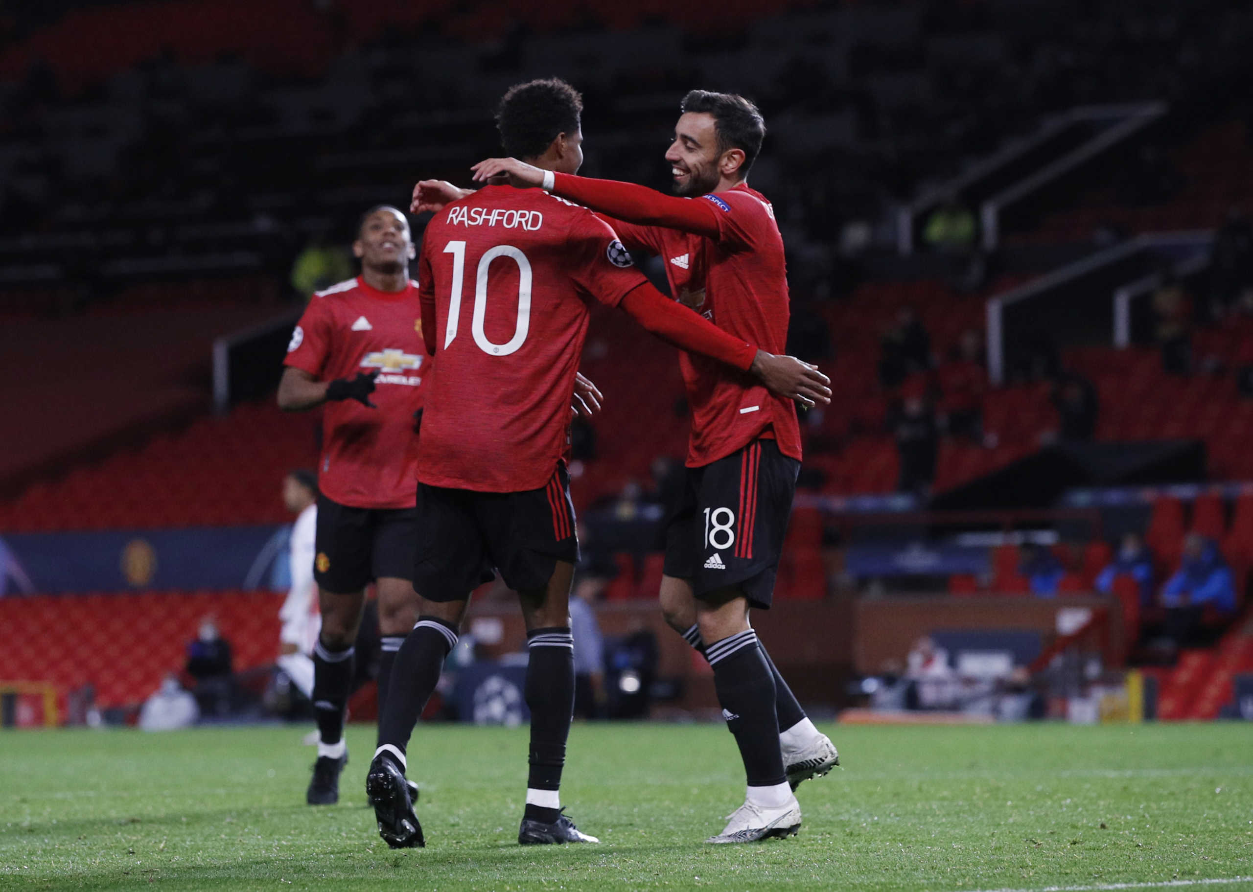 Soccer Football - Champions League - Group H - Manchester United v RB Leipzig - Old Trafford, Manchester, Britain - October 28, 2020 Manchester United's Marcus Rashford celebrates scoring their third goal with Bruno Fernandes REUTERS