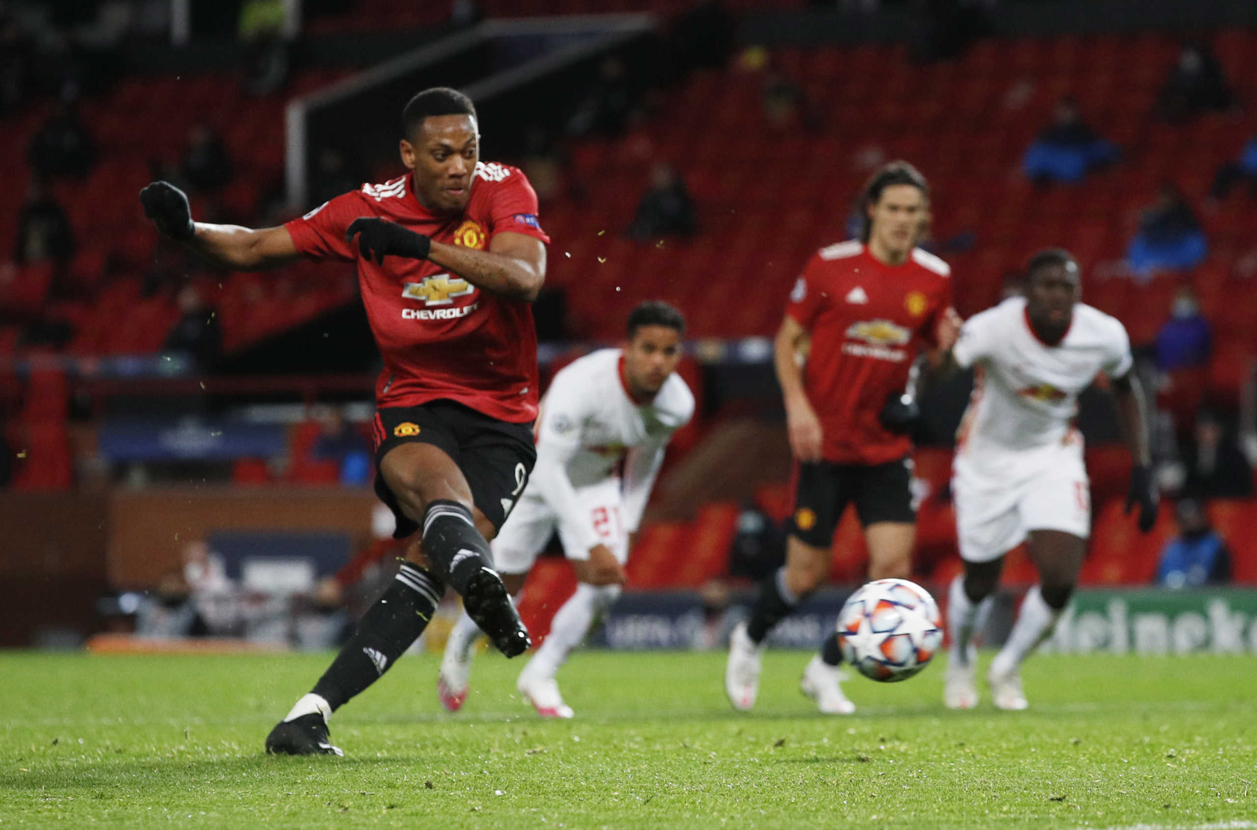 Soccer Football - Champions League - Group H - Manchester United v RB Leipzig - Old Trafford, Manchester, Britain - October 28, 2020 Manchester United's Anthony Martial scores their fourth goal from the penalty spot REUTERS