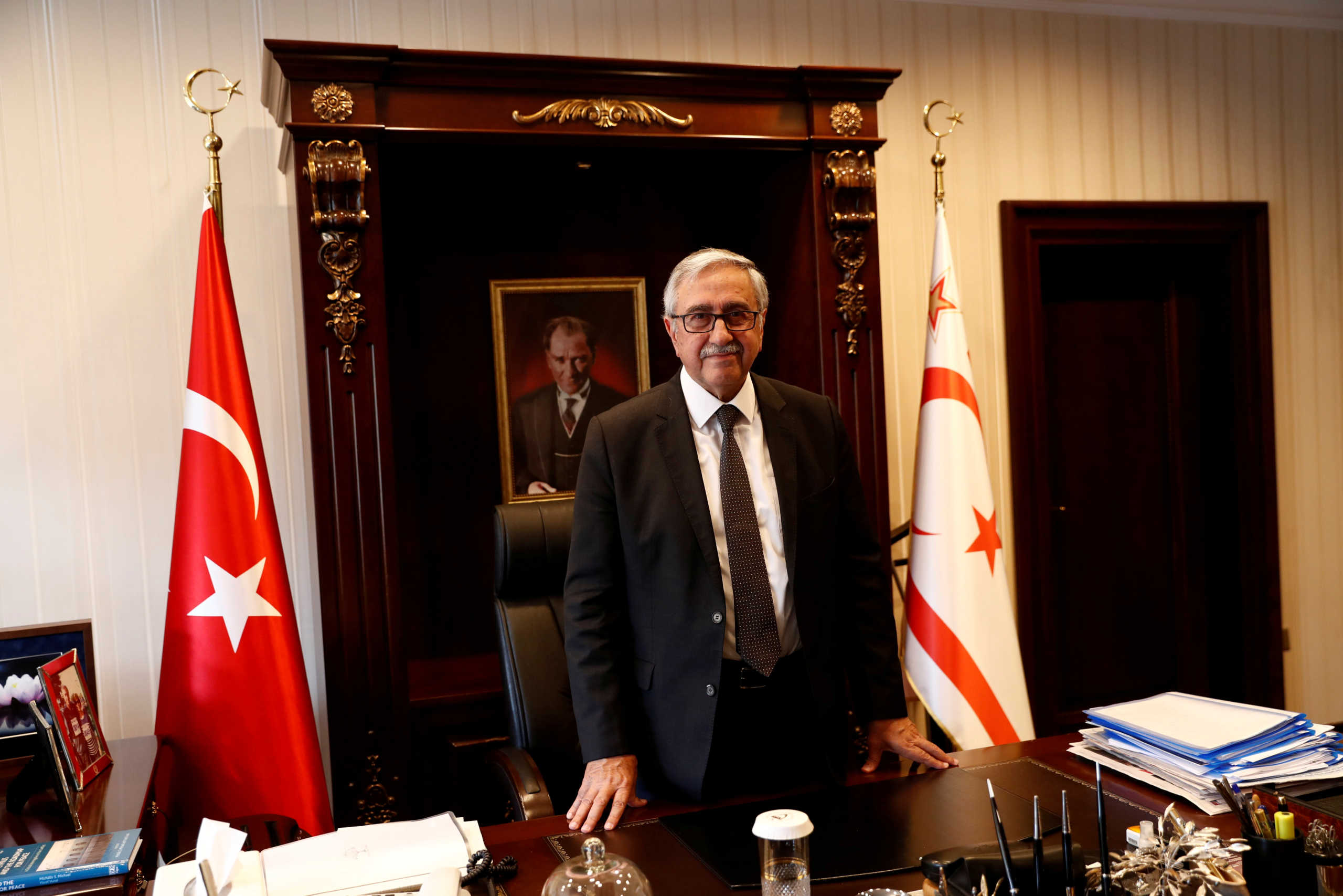 FILE PHOTO: Turkish Cypriot leader Mustafa Akinci poses at his office in the Turkish Cypriot northern part of the divided city of Nicosia, Cyprus, August 5, 2019. Picture taken August 5, 2019. REUTERS