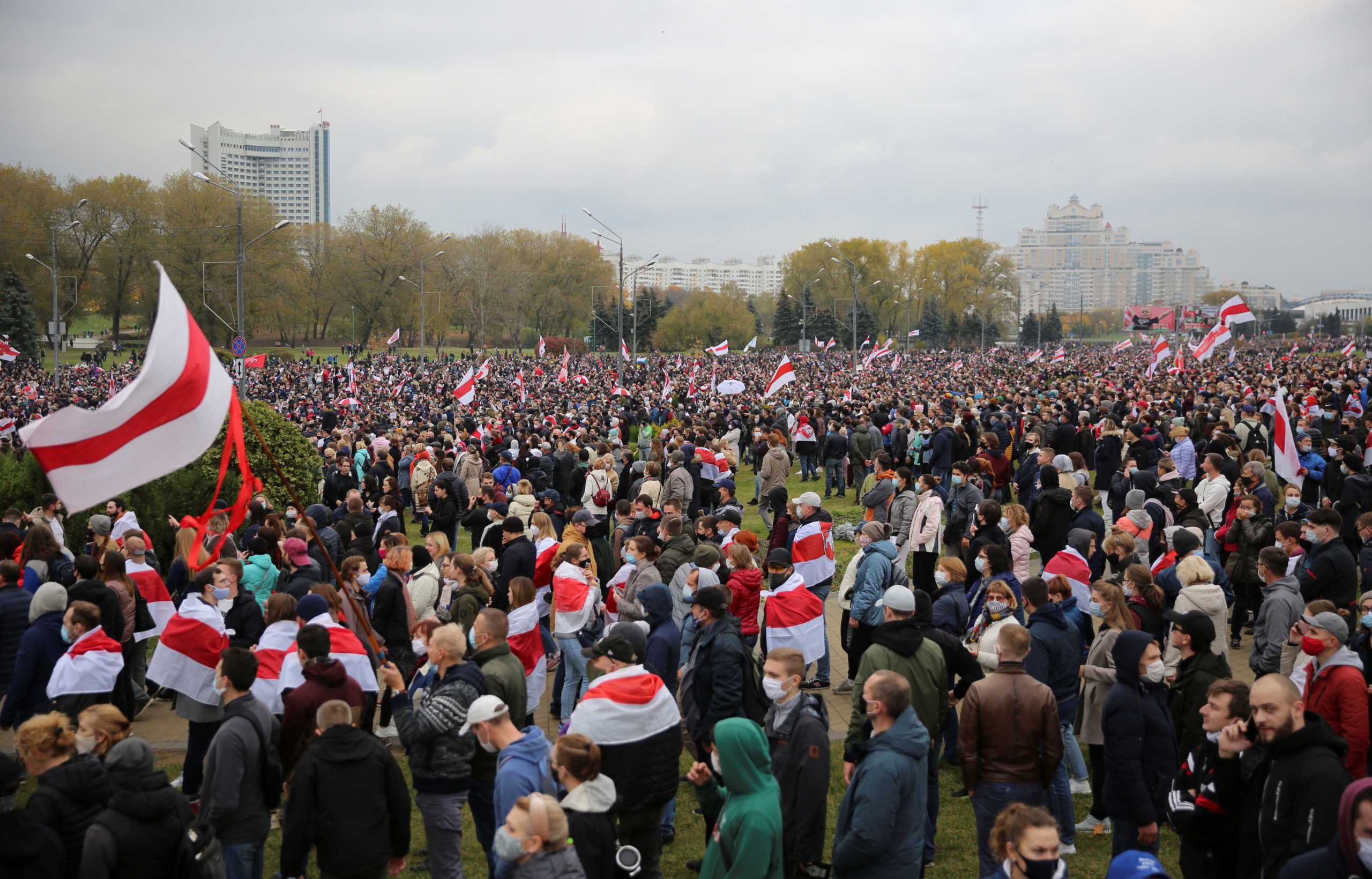 People attend an opposition rally to reject the Belarusian presidential election results in Minsk, Belarus October 25, 2020. REUTERS
