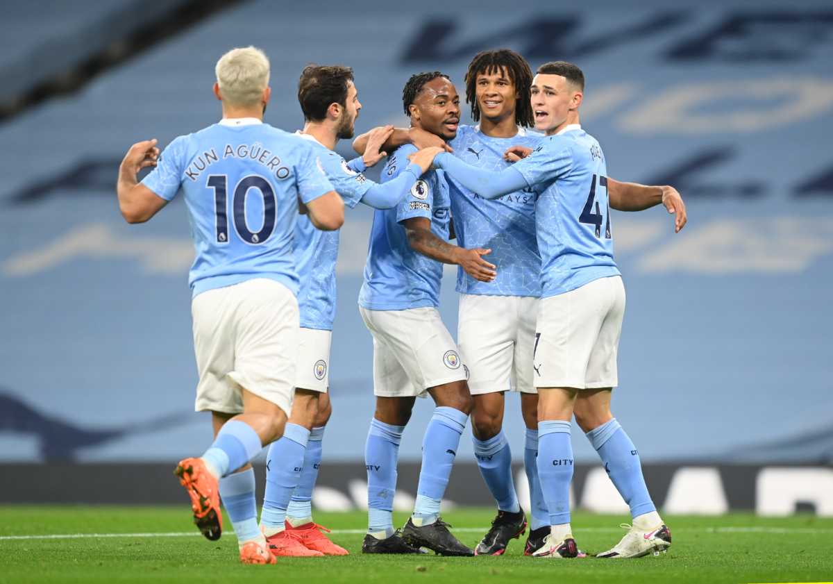 Soccer Football - Premier League - Manchester City v Arsenal - Etihad Stadium, Manchester, Britain - October 17, 2020 Manchester City's Raheem Sterling celebrates scoring their first goal with teammates Pool via REUTERS