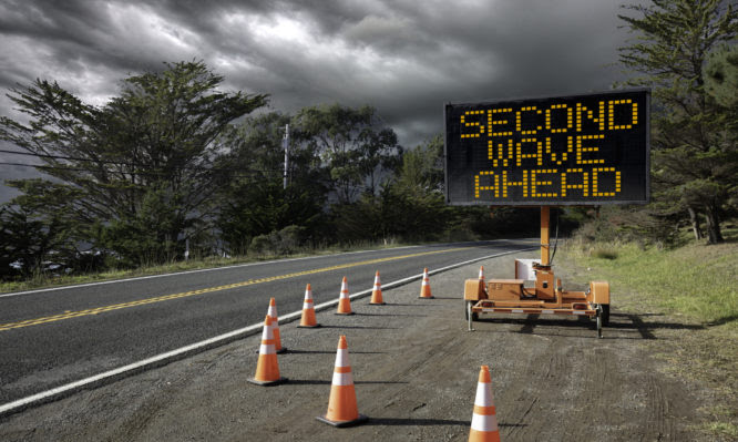 Second Wave of infections for Covid-19 VIRUS on traffic warning sign