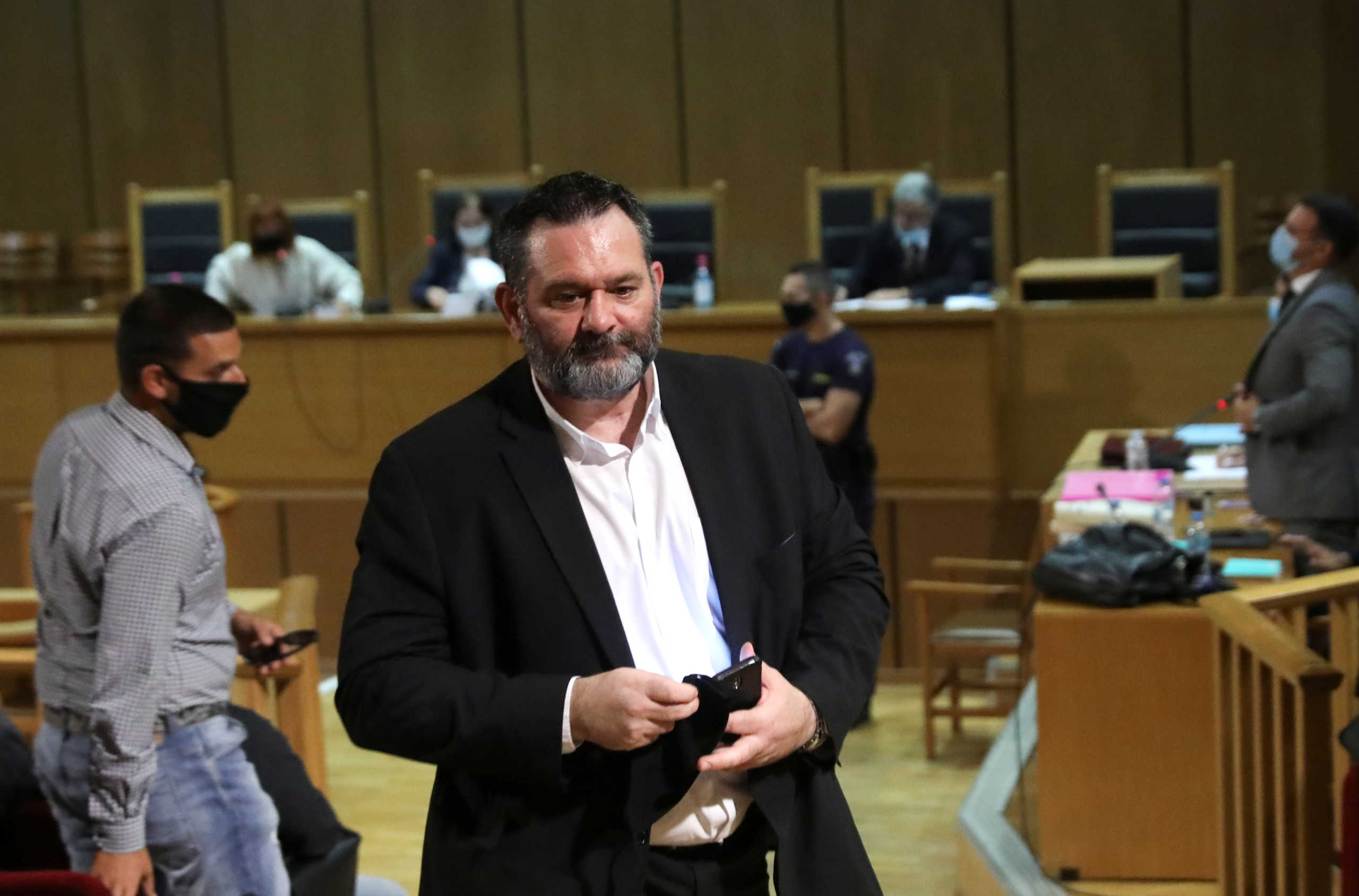 Greek Member of the European Parliament and a former member of Golden Dawn Ioannis Lagos is seen during a break as he attends the trial of leaders and members of the Golden Dawn far-right party that was declared a criminal organisation by court, in Athens Greece, October 12, 2020. REUTERS