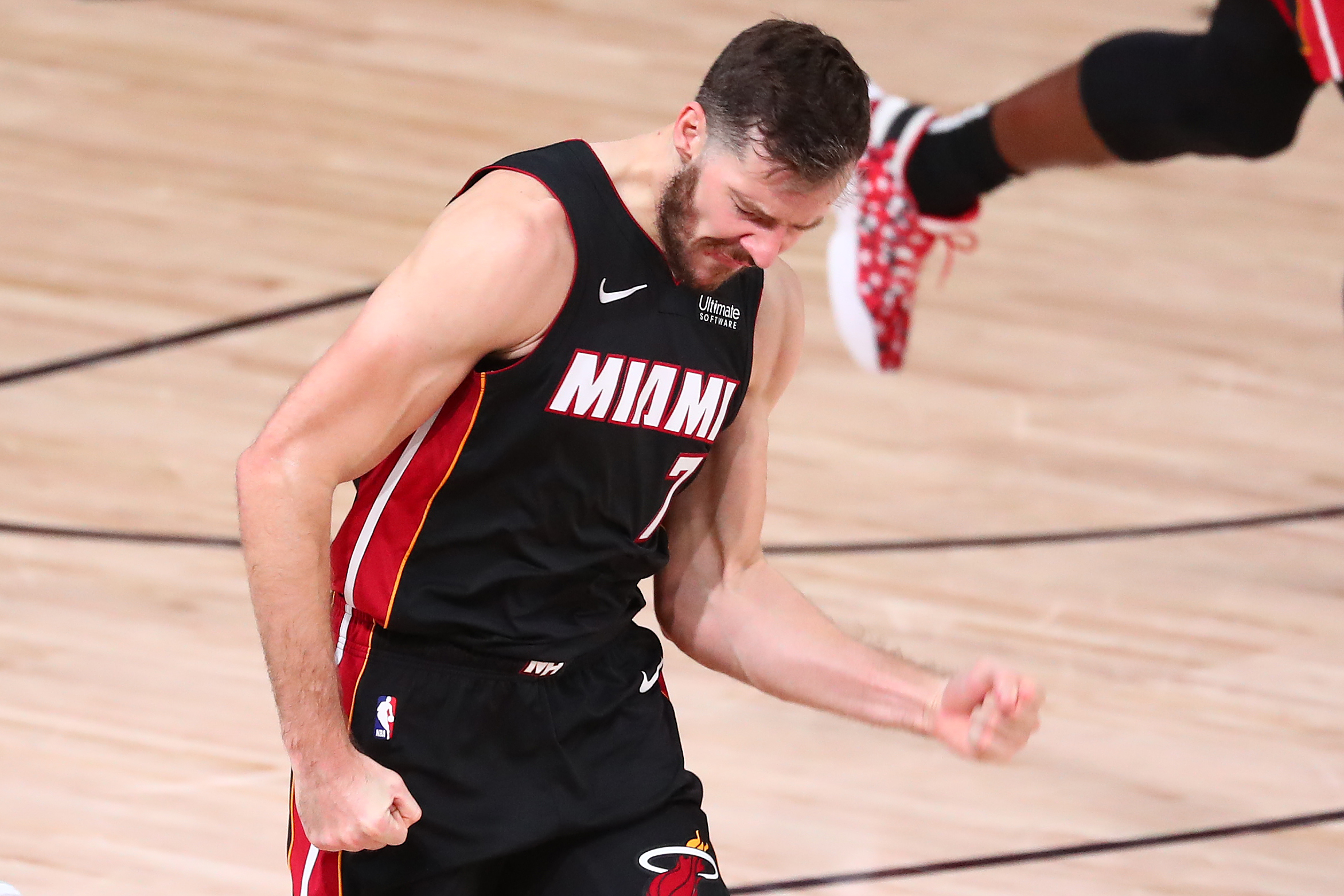 Sep 23, 2020; Lake Buena Vista, Florida, USA; Miami Heat guard Goran Dragic (7) celebrates after making a three point basket against the Boston Celtics during the second half of game four of the Eastern Conference Finals of the 2020 NBA Playoffs at AdventHealth Arena. Mandatory Credit: Kim Klement-USA TODAY Sports