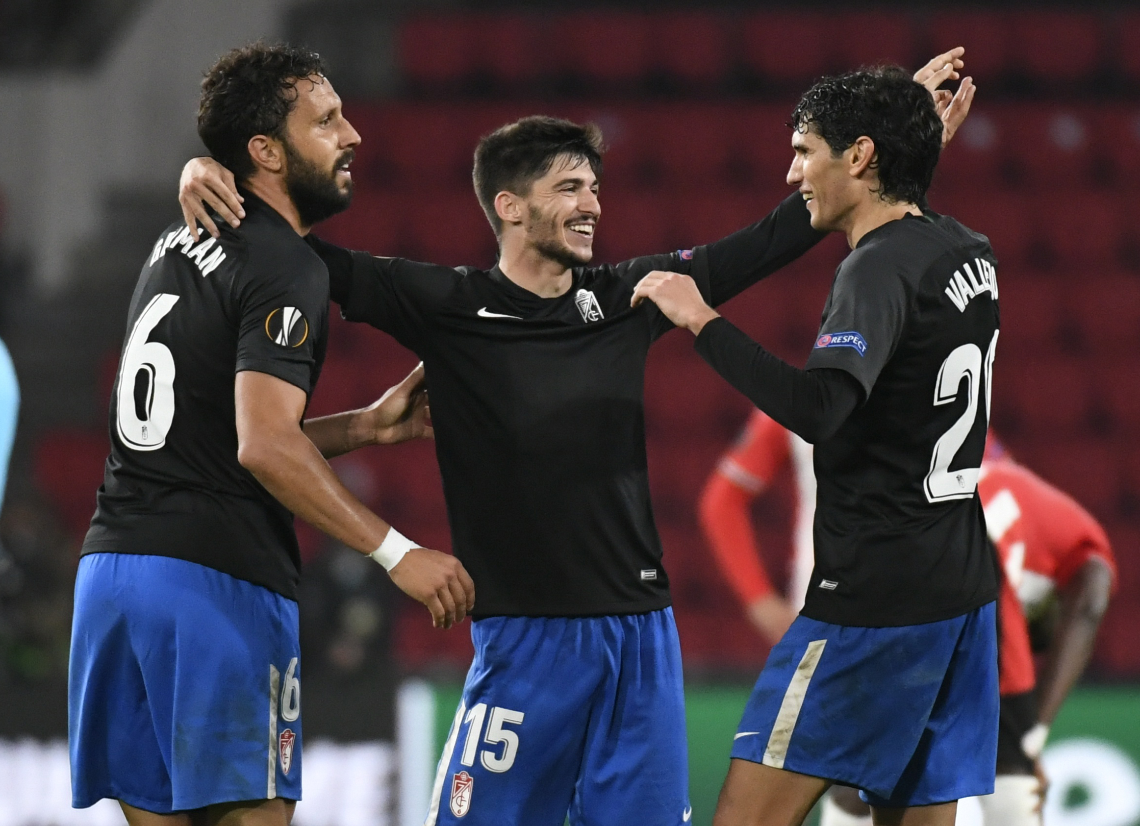 Soccer Football - Europa League - Group E - PSV Eindhoven v Granada - Philips Stadion, Eindhoven, Netherlands - October 22, 2020 Granada's Carlos Neva, German and Jesus Vallejo celebrate at the end of the match REUTERS