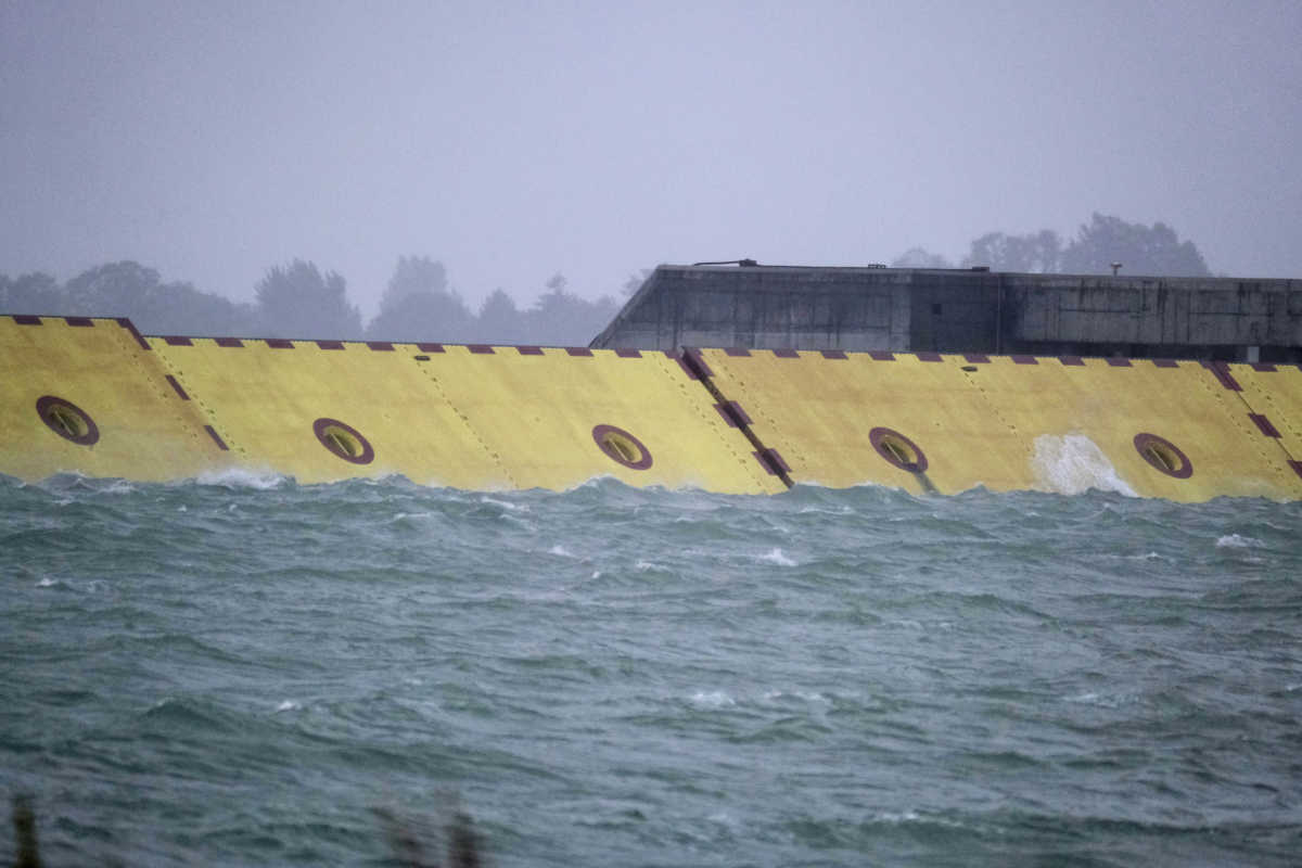 Mose flood barrier scheme is used for the first time, in Venice, Italy, October 3, 2020. REUTERS