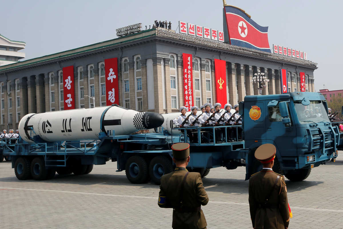 FILE PHOTO: Military vehicles carry missiles with characters reading 'Pukkuksong' during a military parade marking the 105th birth anniversary of North Korea's founding father, Kim Il Sung, in Pyongyang, North Korea, April 15, 2017.     REUTERS