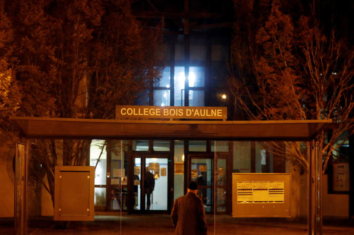 A view shows the scene of a stabbing attack in the Paris suburb of Conflans St Honorine, France, October 16, 2020. REUTERS
