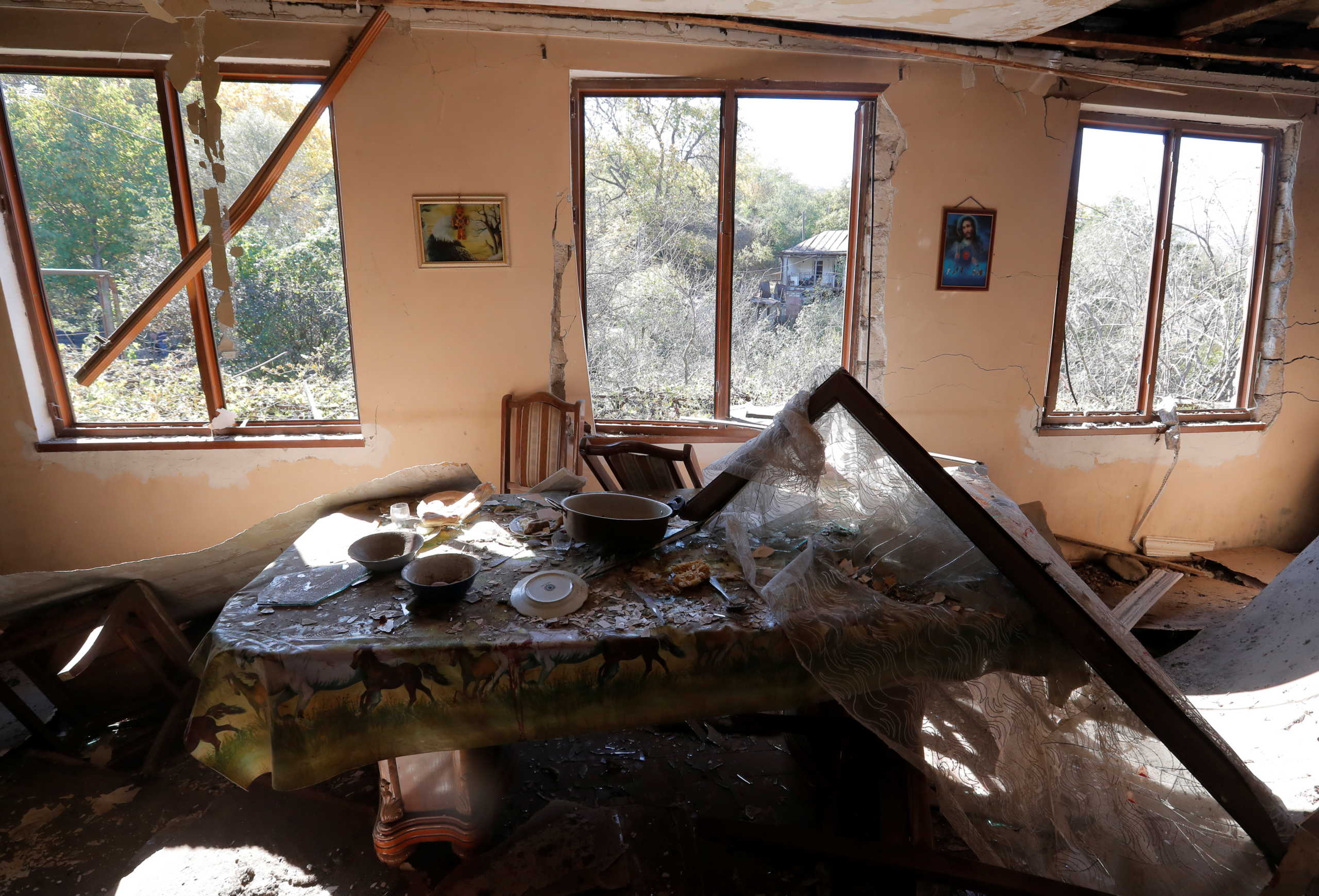 An interior view shows a damaged house following recent shelling in the settlement of Shosh in the course of a military conflict over the breakaway region of Nagorno-Karabakh, October 17, 2020. REUTERS