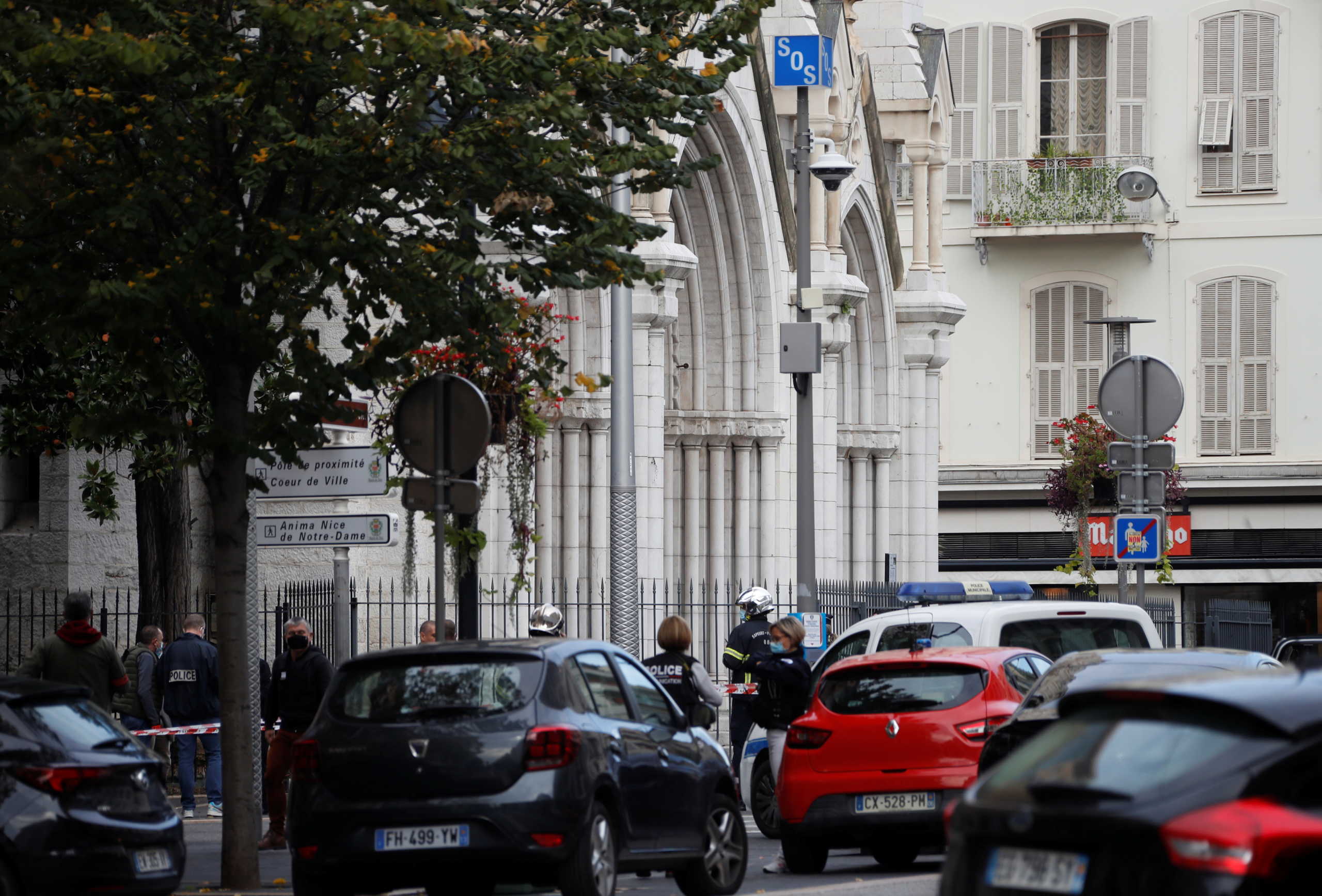 Police officers secure the area after a reported knife attack at Notre Dame church in Nice, France, October 29, 2020. REUTERS