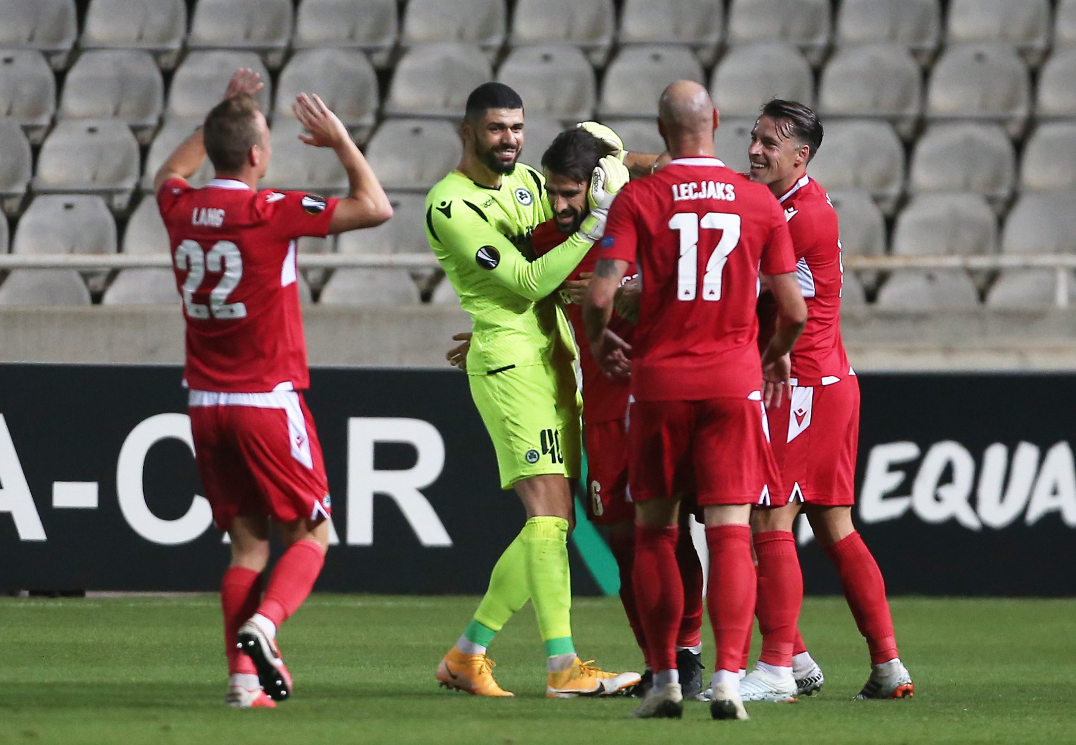 Soccer Football - Europa League - Group E - Omonia v PSV Eindhoven - GSP Stadium, Strovolos, Cyprus - October 29, 2020 Omonia's Jordi Gomez celebrates scoring their first goal with Fabiano and teammates REUTERS