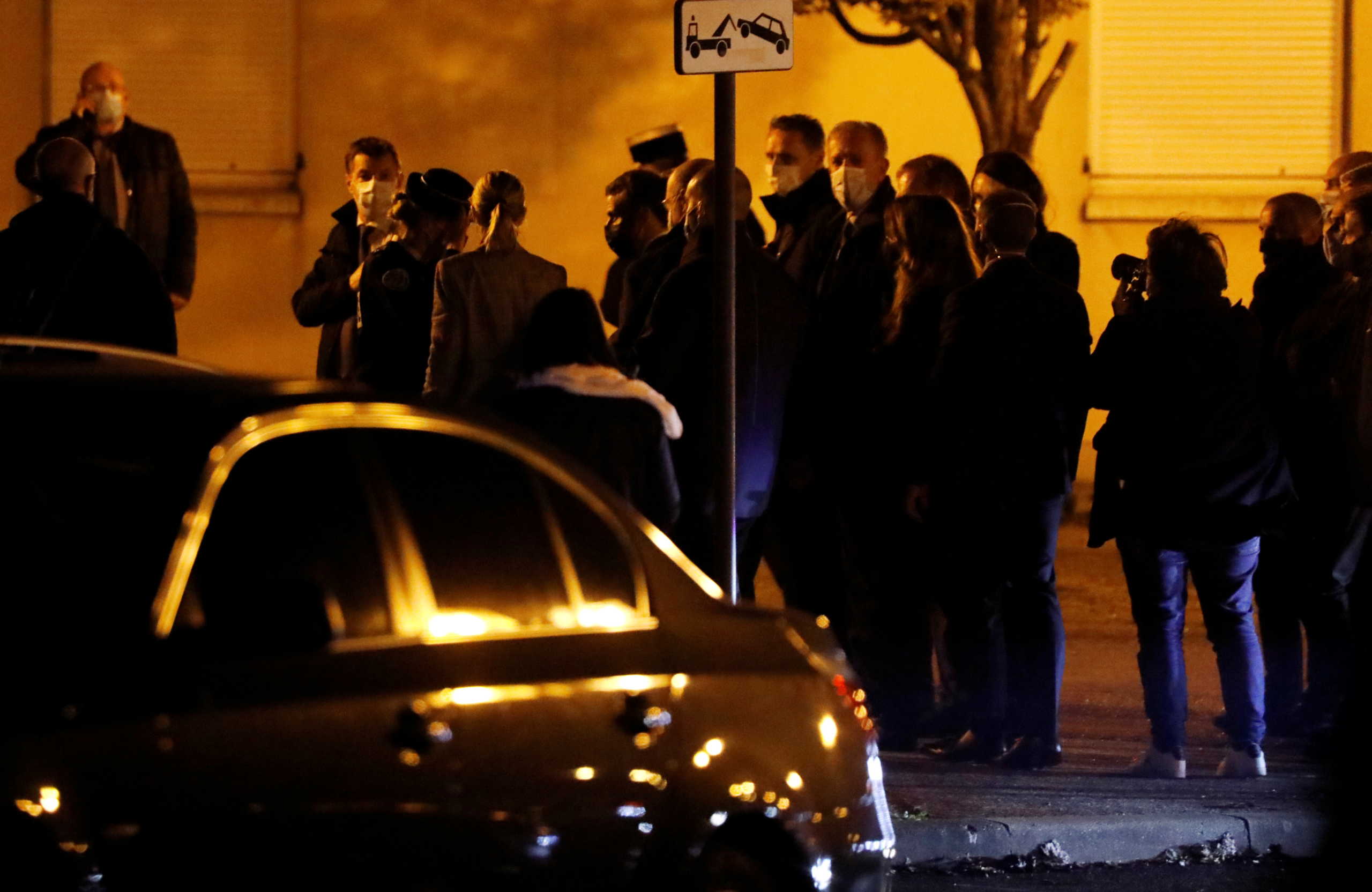 French President Emmanuel Macron arrives to visit the scene of a stabbing attack in the Paris suburb of Conflans St Honorine, France, October 16, 2020. REUTERS
