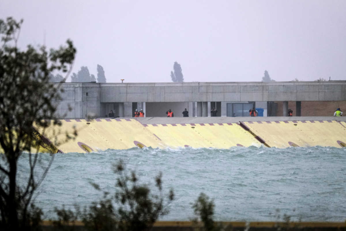 Mose flood barrier scheme is used for the first time, in Venice, Italy, October 3, 2020. REUTERS