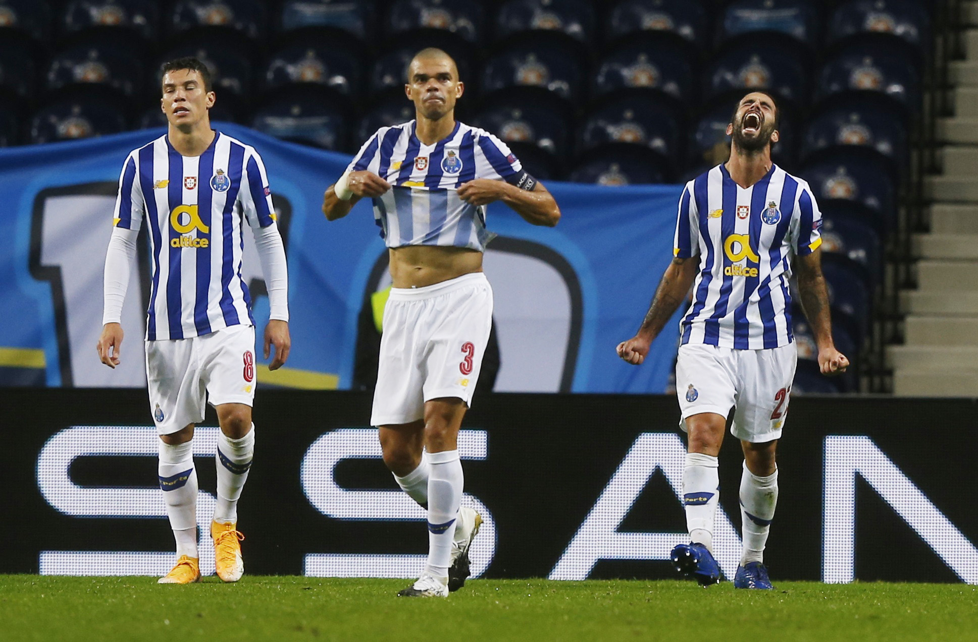 Soccer Football - Champions League - Group C - FC Porto v Olympiacos - Estadio do Dragao, Porto, Portugal - October 27, 2020  FC Porto's Sergio Oliveira celebrates scoring their second goal with teammates REUTERS