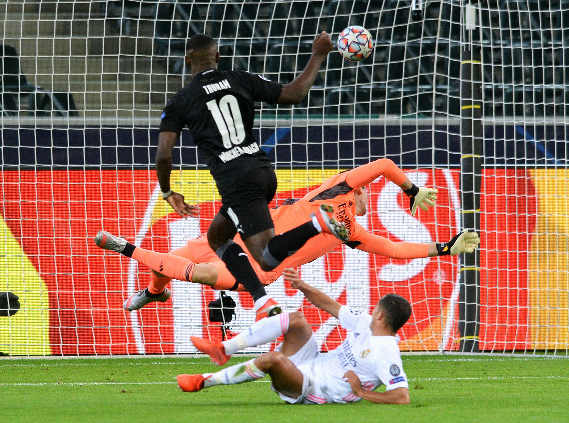 Soccer Football - Champions League - Group B - Borussia Moenchengladbach v Real Madrid - Borussia-Park, Moenchengladbach, Germany - October 27, 2020 Borussia Moenchengladbach's Marcus Thuram scores their first goal REUTERS