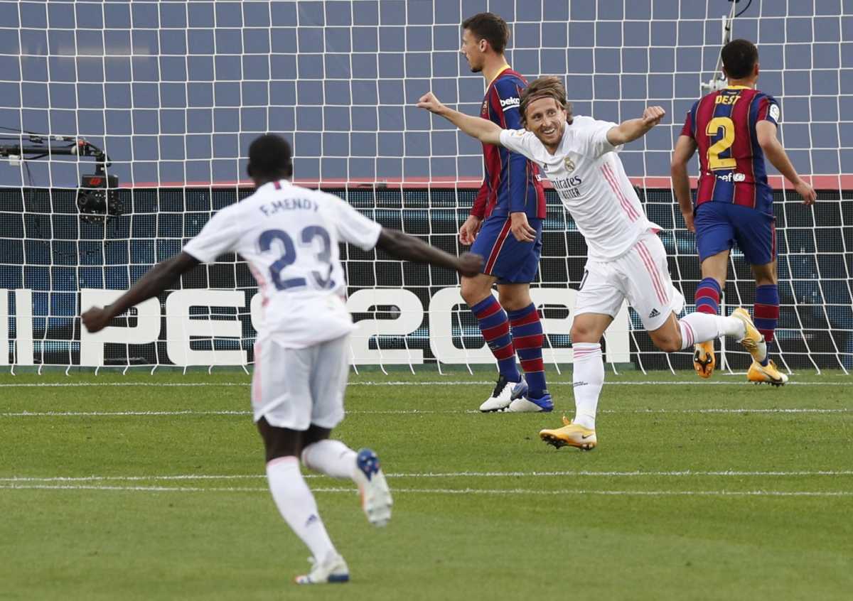 Soccer Football - La Liga Santander - FC Barcelona v Real Madrid - Camp Nou, Barcelona, Spain - October 24, 2020 Real Madrid's Luka Modric celebrates scoring their third goal REUTERS