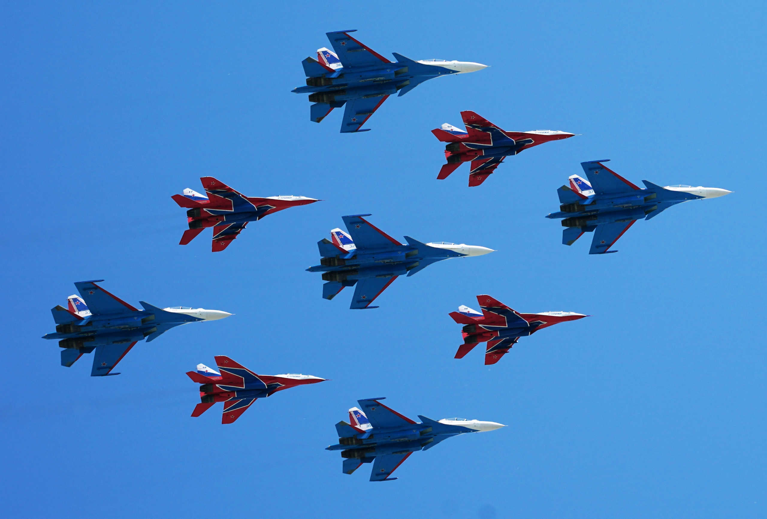 Russian army MiG-29 jet fighters of the Strizhi (Swifts) and Su-30SM jet fighters of the Russkiye Vityazi (Russian Knights) aerobatic teams fly in formation over Red Square during the Victory Day Parade in Moscow, Russia, June 24, 2020. The military parade, marking the 75th anniversary of the victory over Nazi Germany in World War Two, was scheduled for May 9 but postponed due to the outbreak of the coronavirus disease (COVID-19). Host photo agency