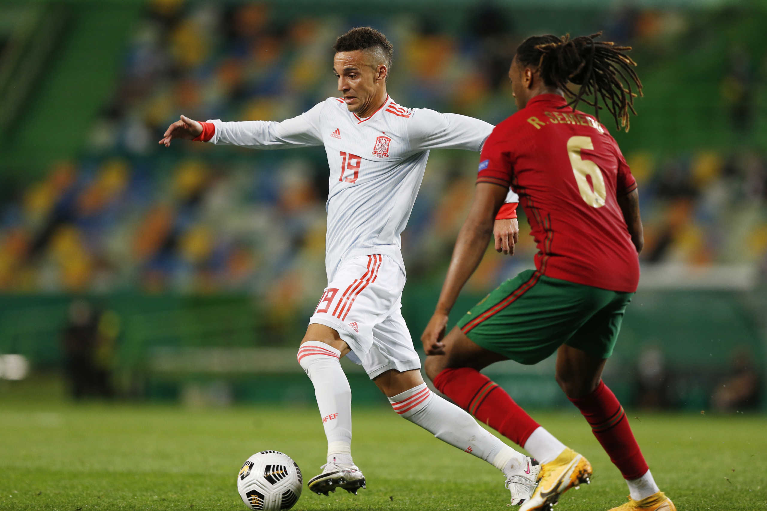 Soccer Football - International Friendly - Portugal v Spain - Estadio Jose Alvalade, Lisbon, Portugal - October 7, 2020 Spain's Rodrigo in action with Portugal's Ruben Semedo REUTERS