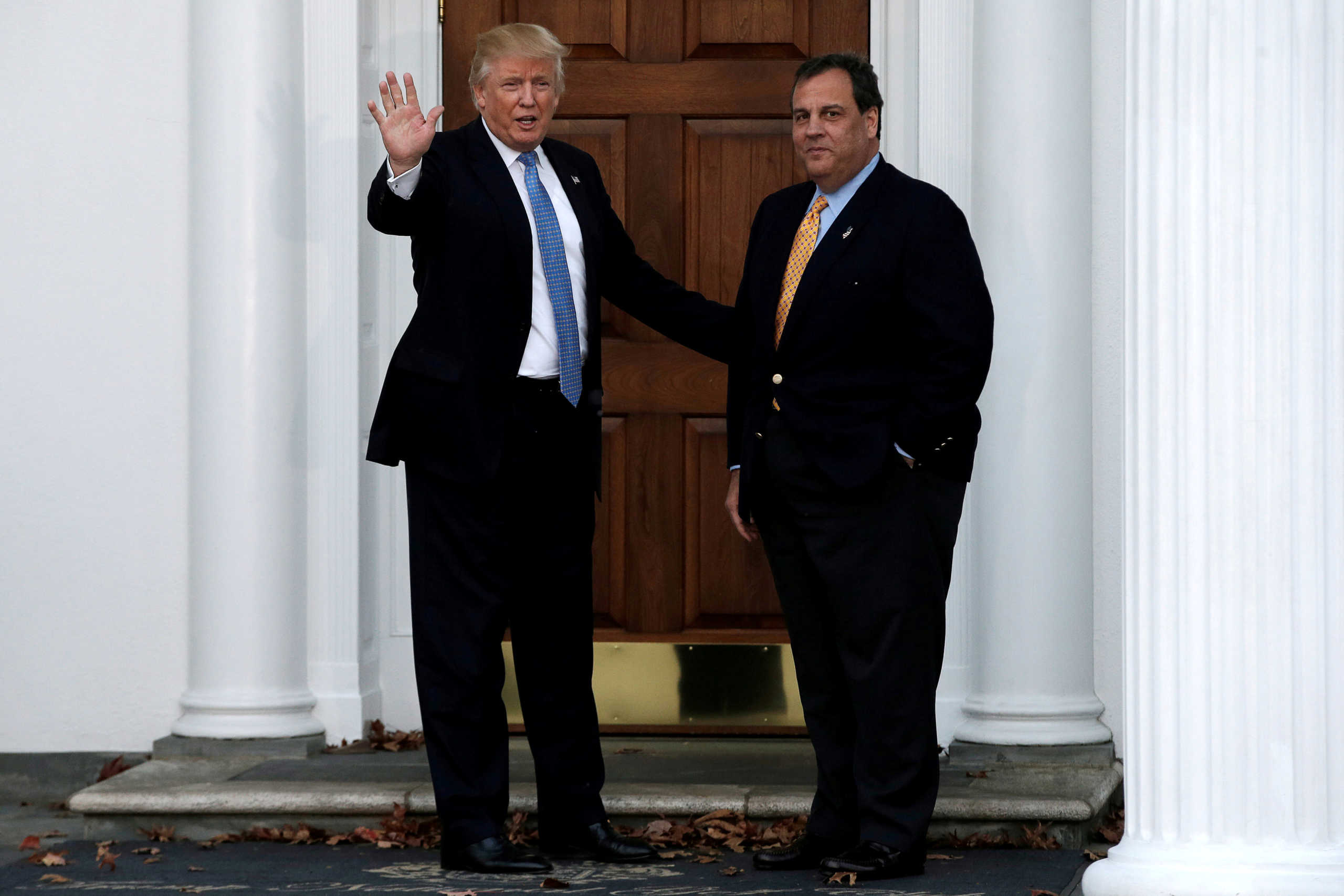 FILE PHOTO: U.S. President-elect Donald Trump stands with New Jersey Governor Chris Christie before their meeting at Trump National Golf Club in Bedminster, New Jersey, U.S., November 20, 2016.  REUTERS