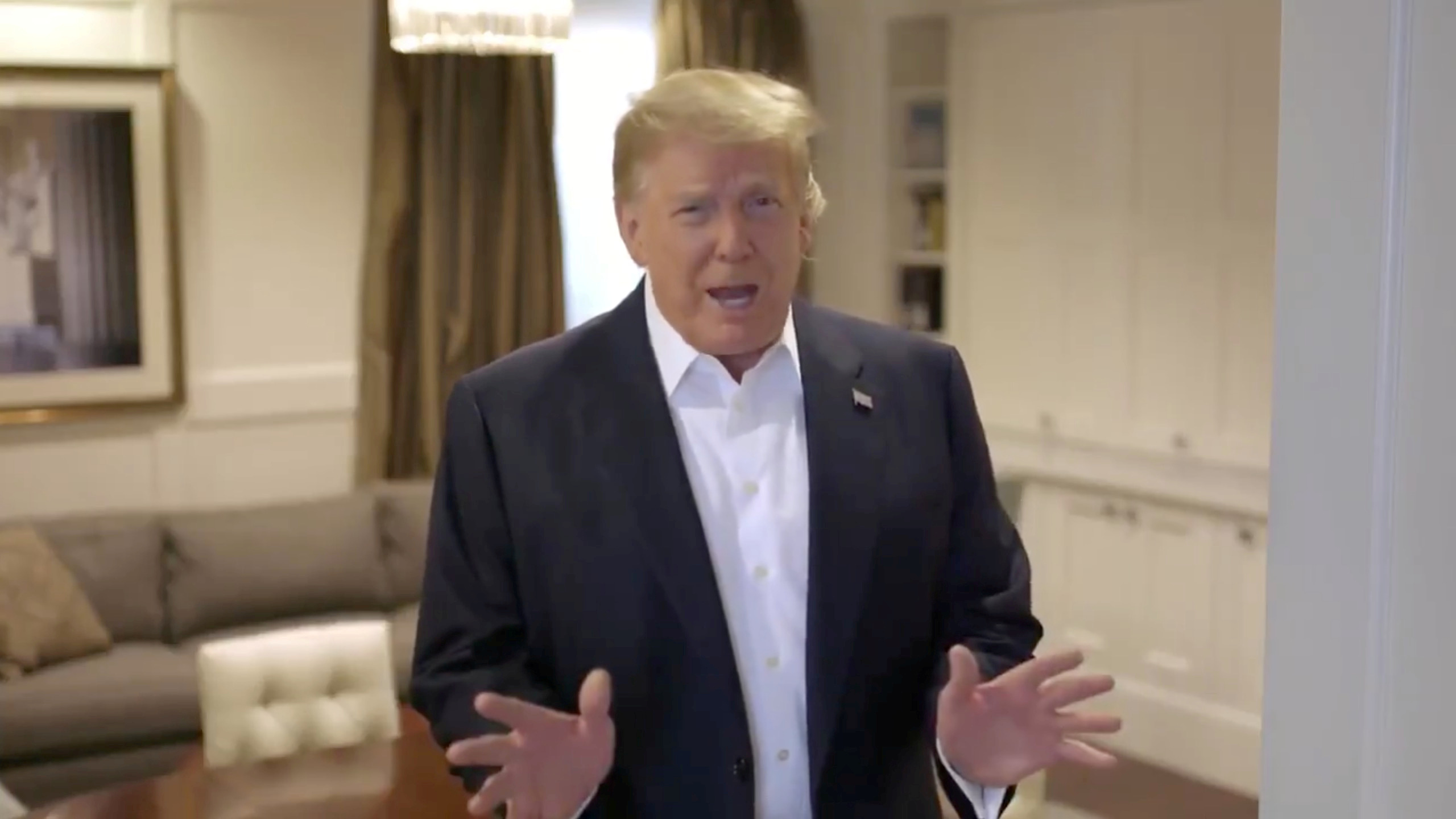 FILE PHOTO: U.S. President Donald Trump makes an announcement from the Walter Reed National Military Medical Center, where he was being treated for the coronavirus disease (COVID-19), in Bethesda, Maryland, U.S. October 4, 2020, in this still image taken from a video posted on Trump's twitter page. DONALD TRUMP via TWITTER via REUTERS.