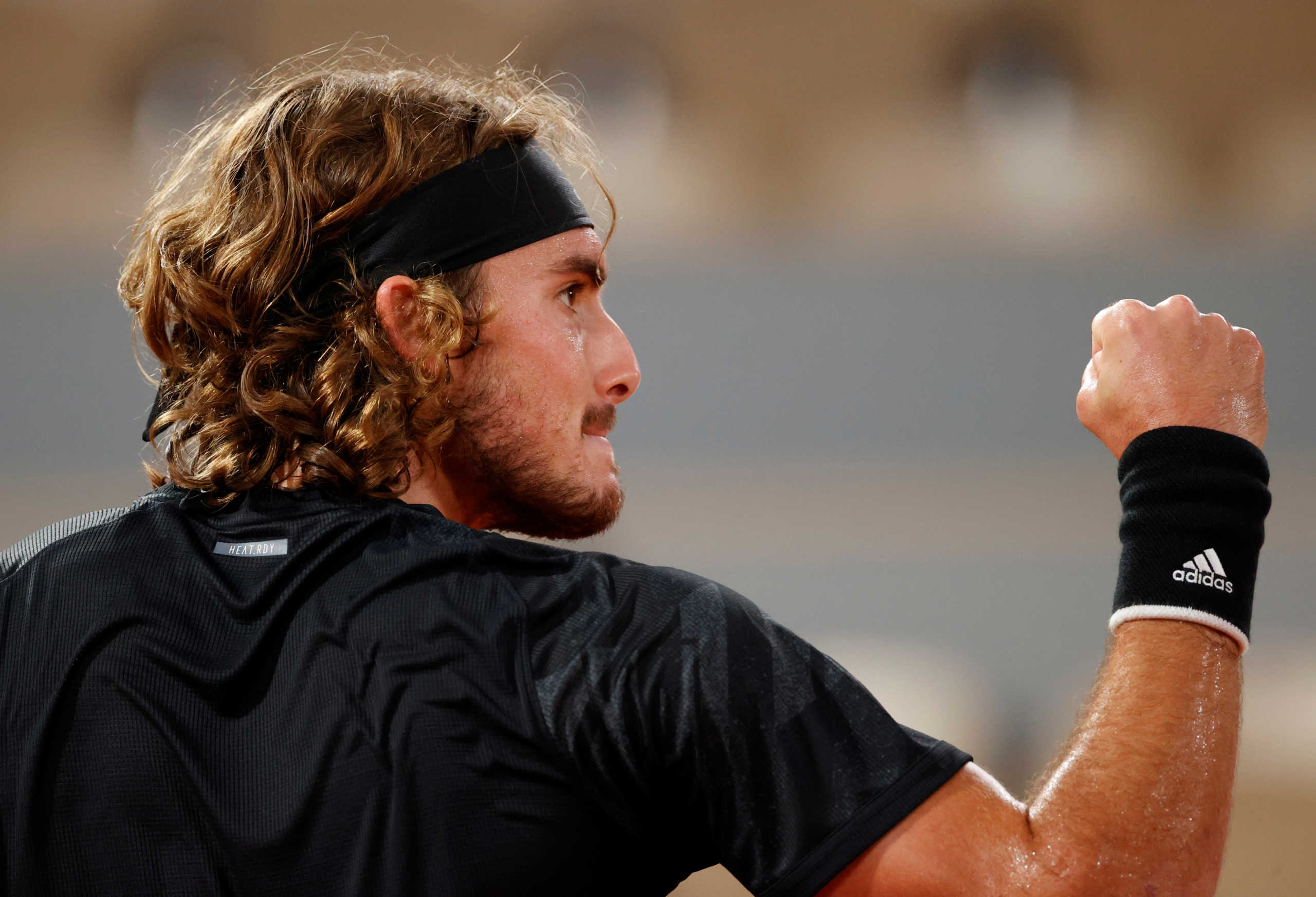 Tennis - French Open - Roland Garros, Paris, France - October 5, 2020  Greece's Stefanos Tsitsipas reacts during his fourth round match against Bulgaria's Grigor Dimitrov  REUTERS