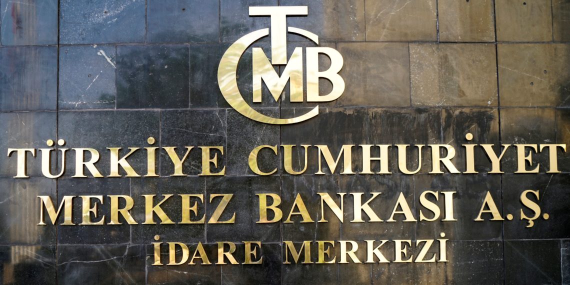 FILE PHOTO: A logo of Turkey's Central Bank is pictured at the entrance of the bank's headquarters in Ankara, Turkey April 19, 2015. REUTERS