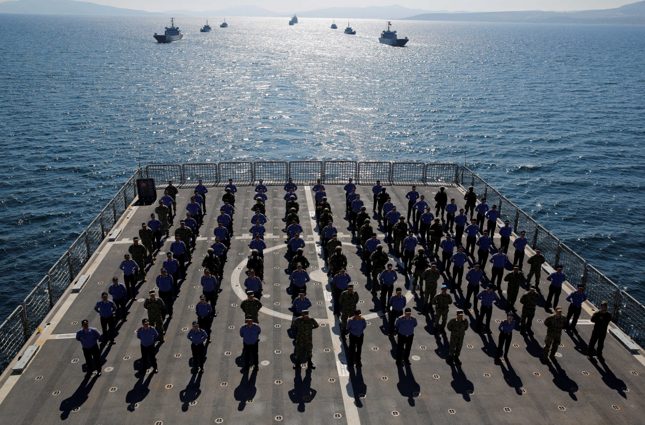 FILE PHOTO: Crew members of the amphibious landing ship tank (LST) TCG Bayraktar (L-402) pose after a landing drill during the Blue Homeland naval exercise off the Aegean coastal town of Foca in Izmir Bay, Turkey March 5, 2019. REUTERS