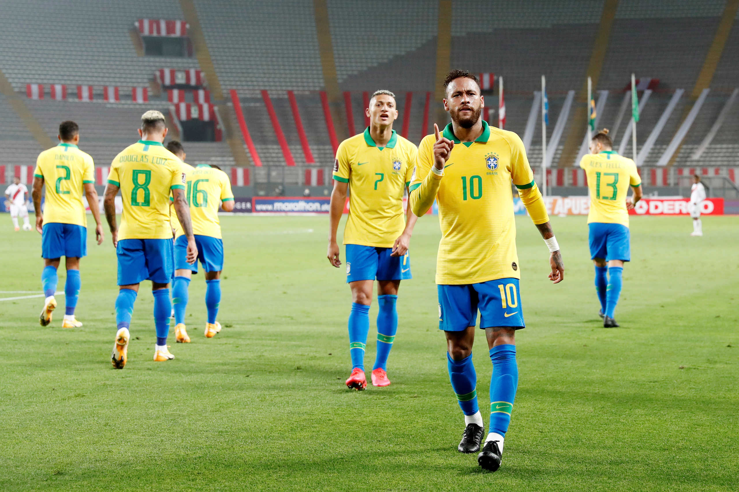 Soccer Football - World Cup 2022 South American Qualifiers - Peru v Brazil - Nacional Stadium, Lima, Peru - October 13, 2020 Brazil's Neymar celebrates scoring their fourth goal with teammates Paolo Aguilar