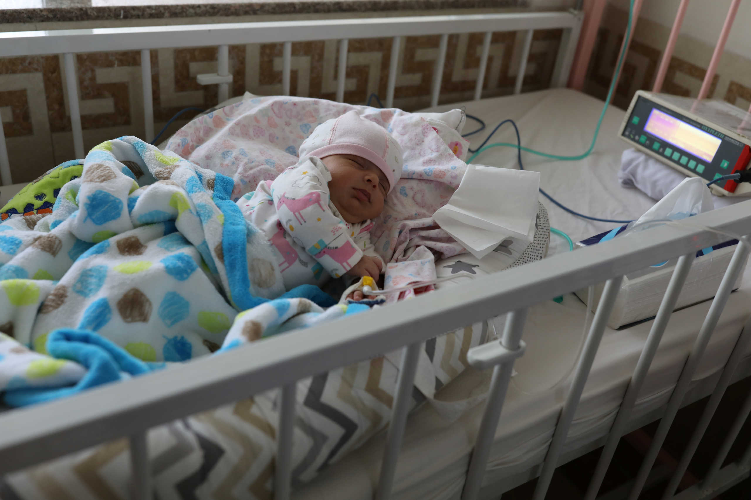 Roshana, a new born baby who is affected by the coronavirus disease (COVID-19), is seen at Hazrate Ali Asghar Hospital, in Tehran, Iran September 27, 2020. Picture taken September 27, 2020. Majid Asgaripour