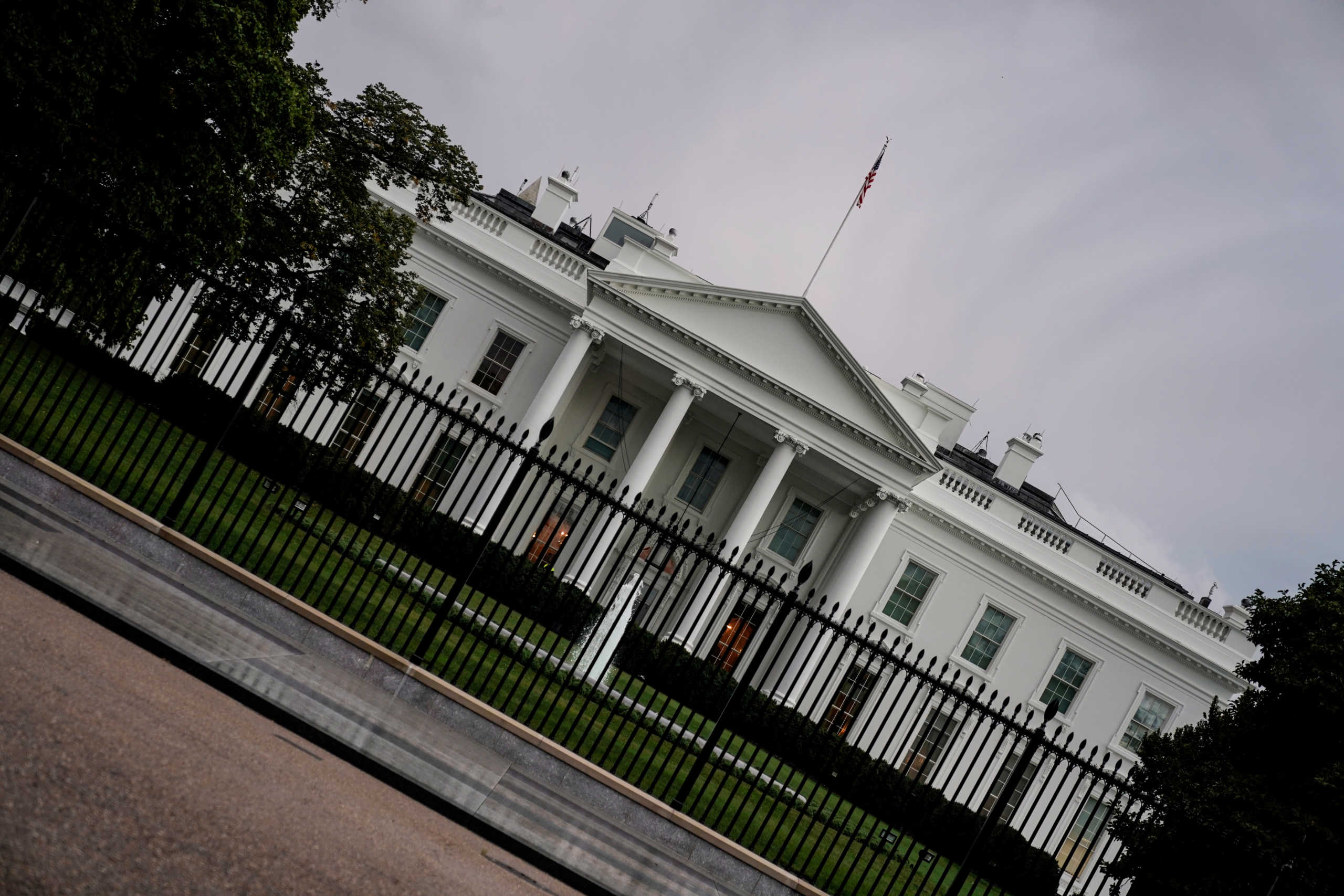 Clouds pass over the White House after U.S. President Donald Trump announced that he and U.S. first lady Melania Trump have both tested positive for the coronavirus disease (COVID-19) in Washington, U.S., October 2, 2020.      REUTERS
