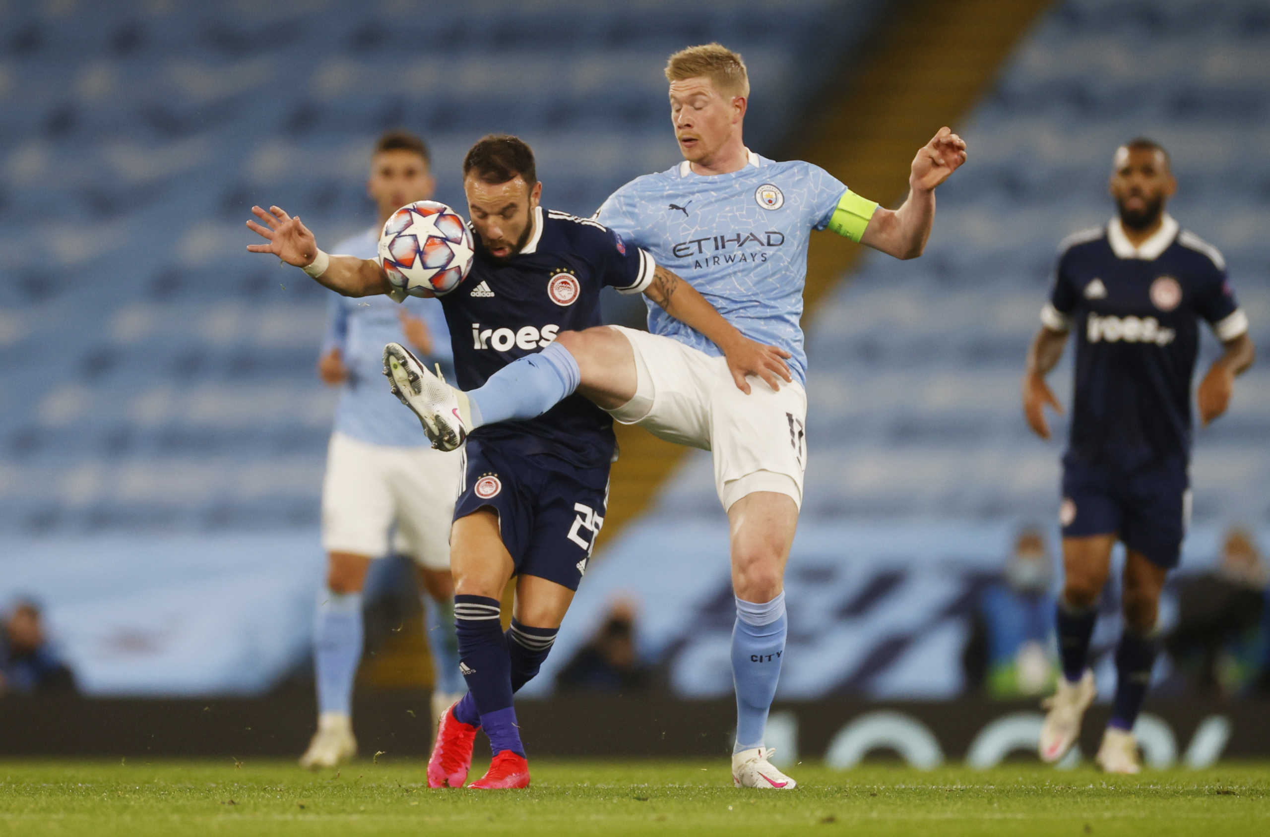 Soccer Football - Champions League - Group C - Manchester City v Olympiacos - Etihad Stadium, Manchester, Britain - November 3, 2020 Olympiacos' Mathieu Valbuena in action with Manchester City's Kevin De Bruyne REUTERS