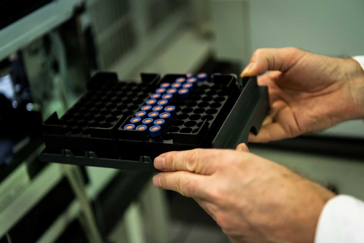 A laboratory assistant holds tubes with Russia's "Sputnik-V" vaccine against the coronavirus disease (COVID-19) at the National Institute of Pharmacy and Nutrition in Budapest, Hungary, November 19, 2020. Matyas Borsos