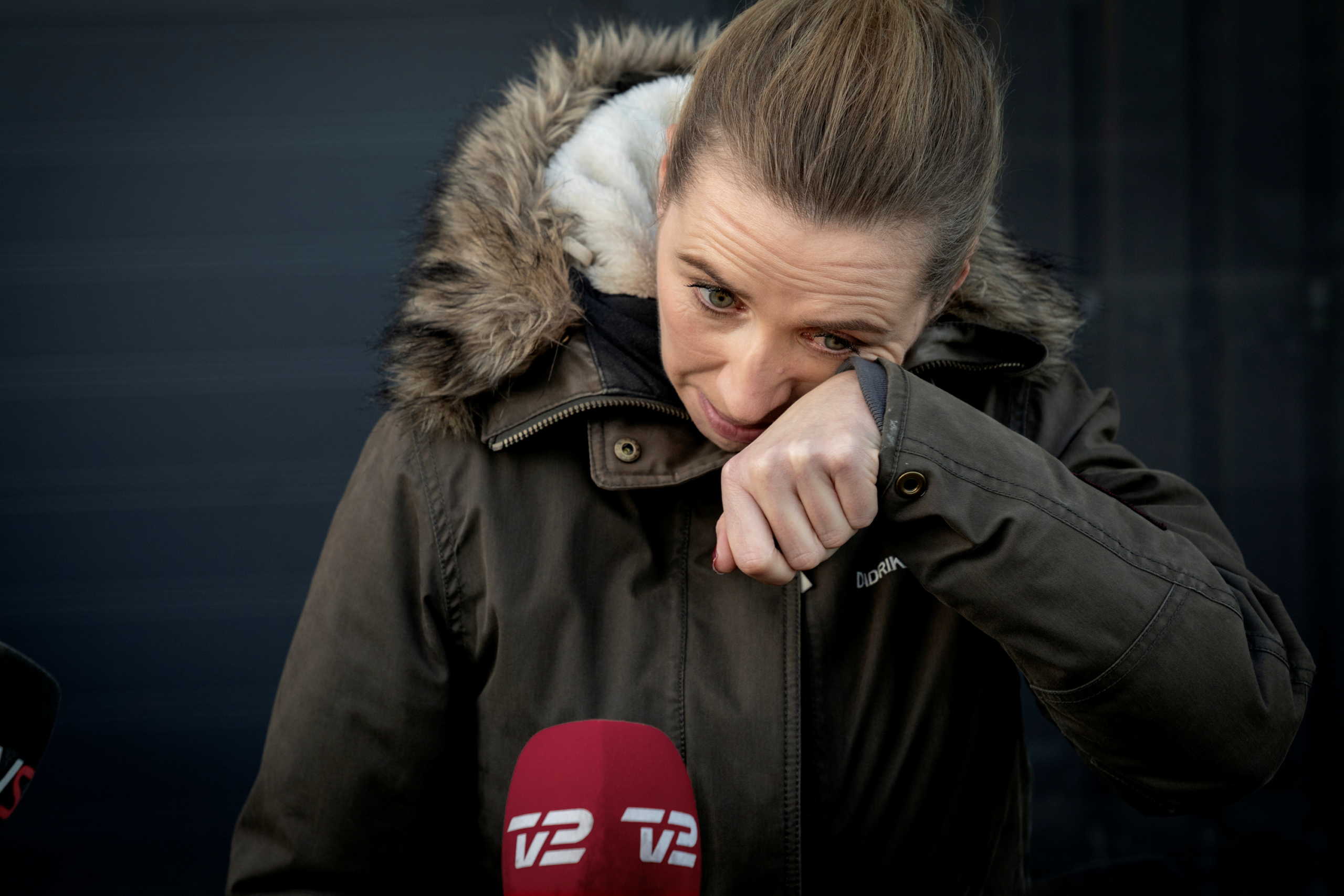 Denmark's Prime Minister Mette Frederiksen reacts after a visit to an empty Mink Farm near Kolding, Denmark, November 26, 2020. Mads Nissen