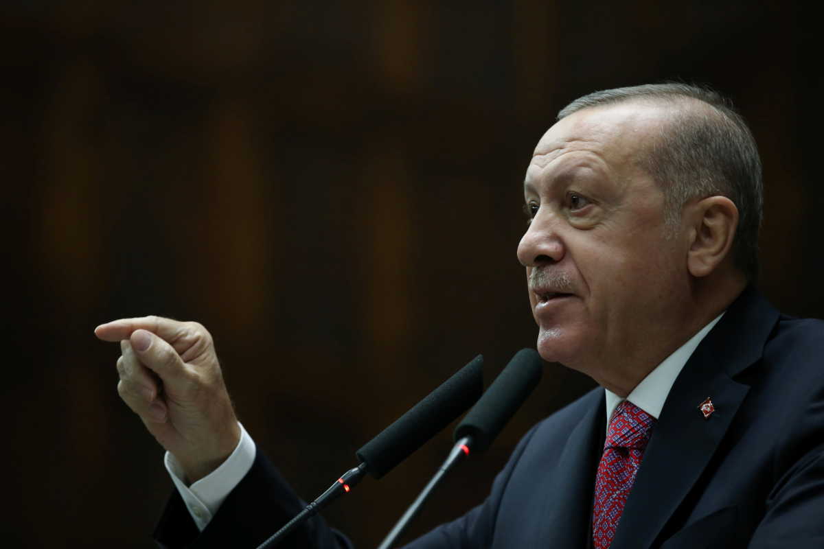Turkish President Tayyip Erdogan addresses members of his ruling AKP during a meeting at the parliament in Ankara, Turkey, November 25, 2020. Presidential Press Office