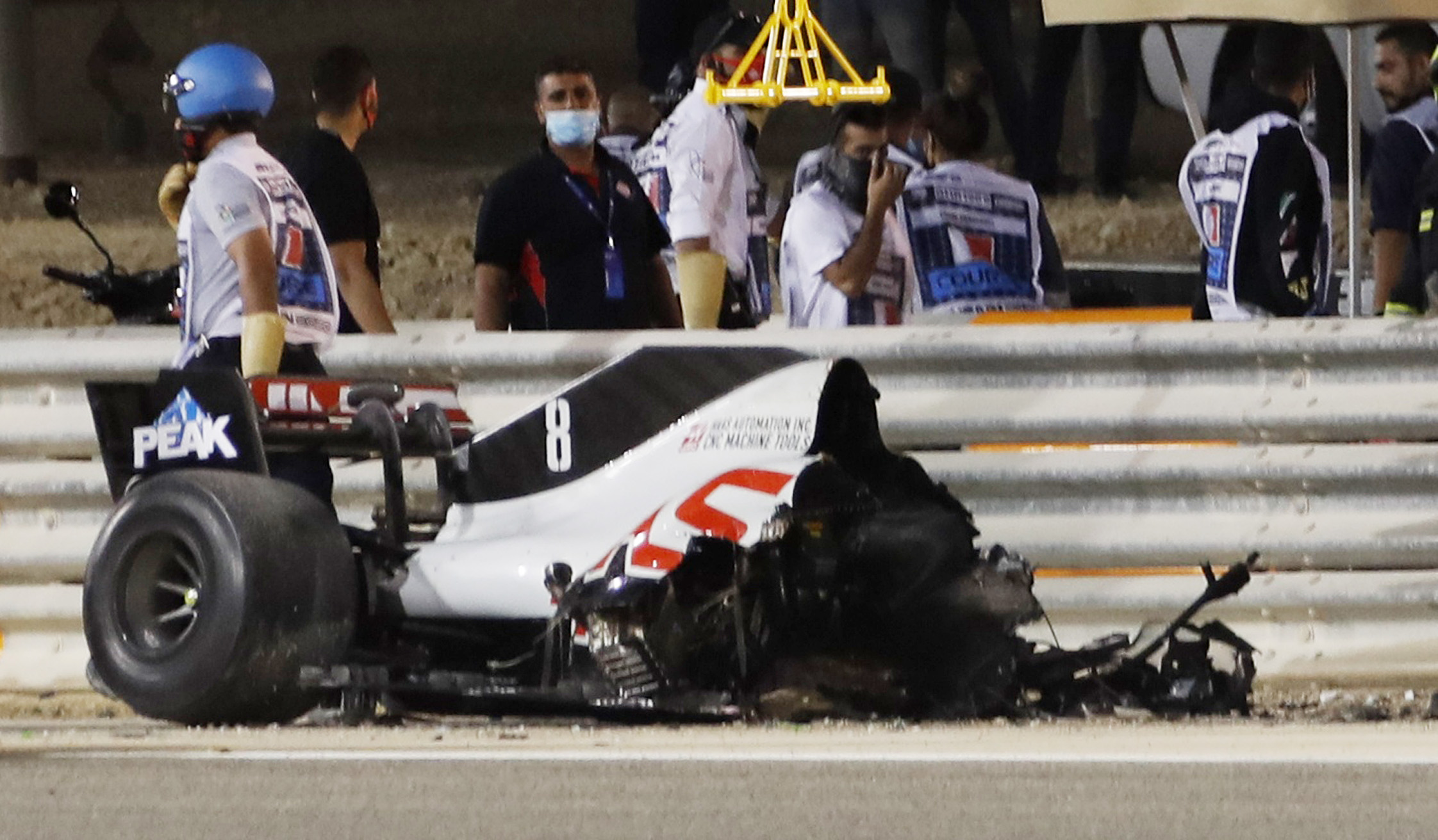 Formula One F1 - Bahrain Grand Prix - Bahrain International Circuit, Sakhir, Bahrain - November 29, 2020 General view of the wreckage of the car of Haas' Romain Grosjean after he crashed out of the race Pool via REUTERS