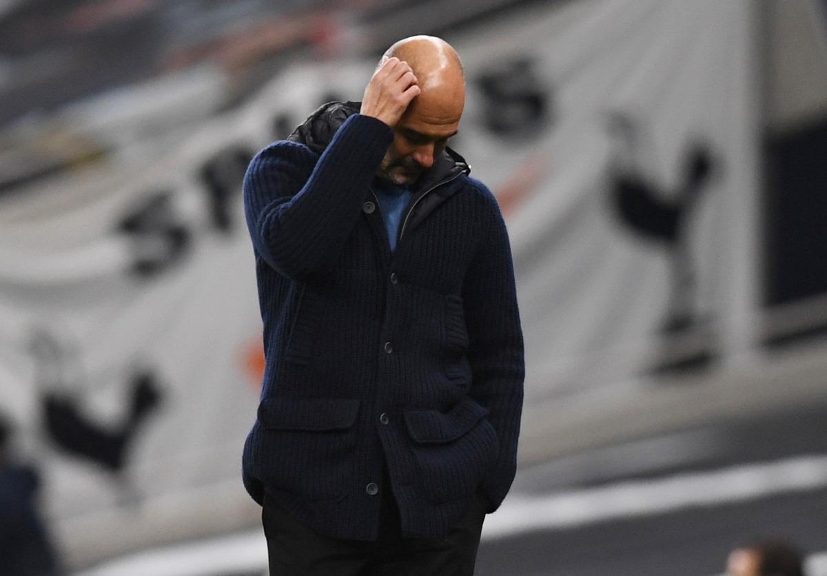 Soccer Football - Premier League - Tottenham Hotspur v Manchester City - Tottenham Hotspur Stadium, London, Britain - November 21, 2020 Manchester City manager Pep Guardiola reacts Pool via REUTERS