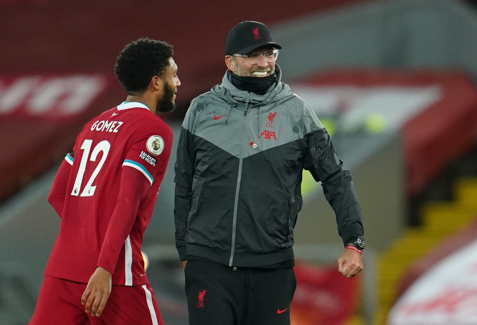 Soccer Football - Premier League - Liverpool v West Ham United - Anfield, Liverpool, Britain - October 31, 2020  Liverpool manager Juergen Klopp celebrates after the match with Joe Gomez Pool via REUTERS