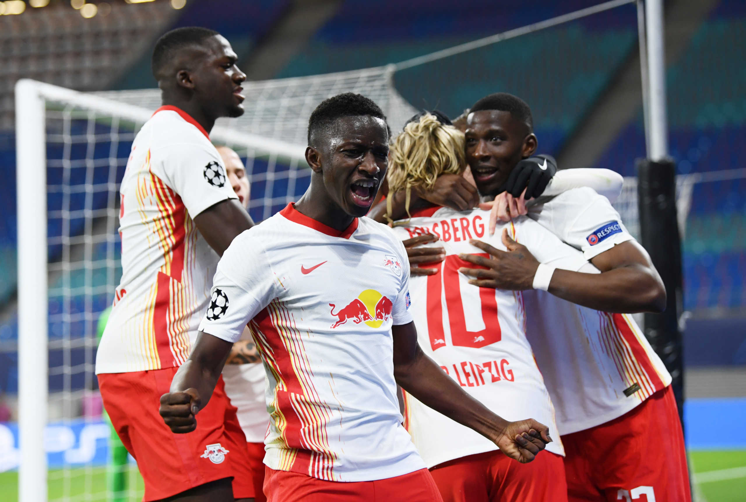 Soccer Football - Champions League - Group H - RB Leipzig v Paris St Germain - Red Bull Arena, Leipzig, Germany - November 4, 2020 RB Leipzig players celebrate their second goal scored by Emil Forsberg REUTERS