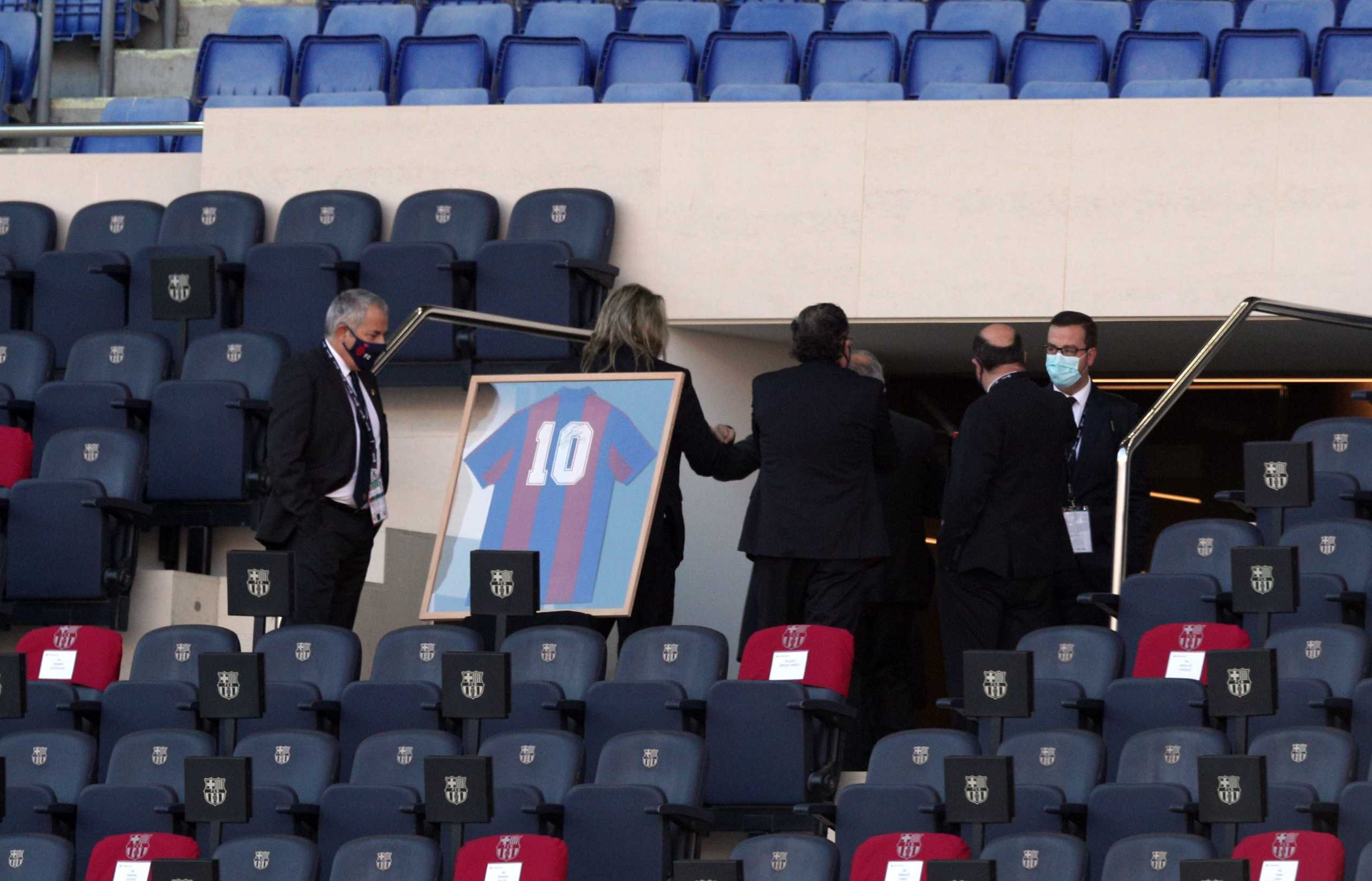 Soccer Football - La Liga Santander - FC Barcelona v Osasuna - Camp Nou, Barcelona, Spain - November 29, 2020 General view of a framed shirt of the former FC Barcelona player Diego Maradona REUTERS